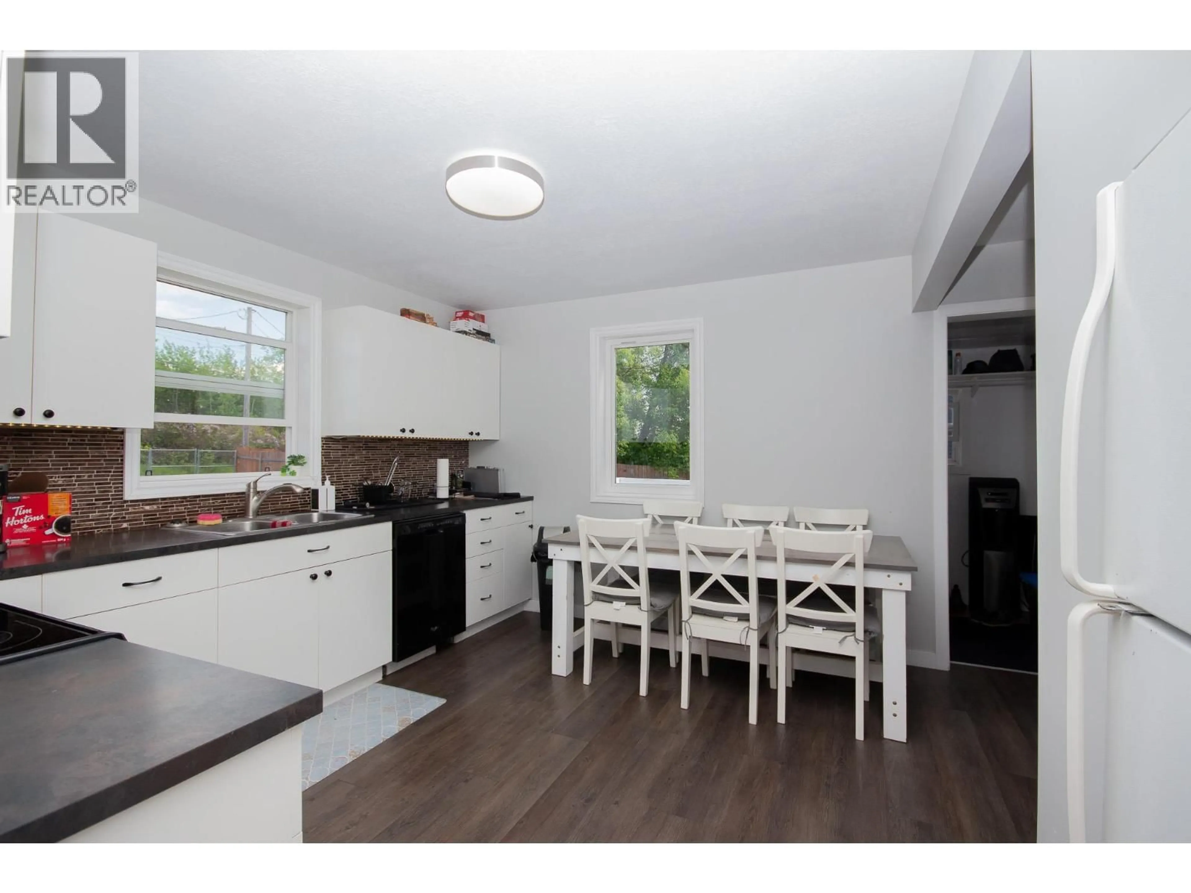 Standard kitchen, wood/laminate floor for 9116 8 STREET, Dawson Creek British Columbia V1G3N4