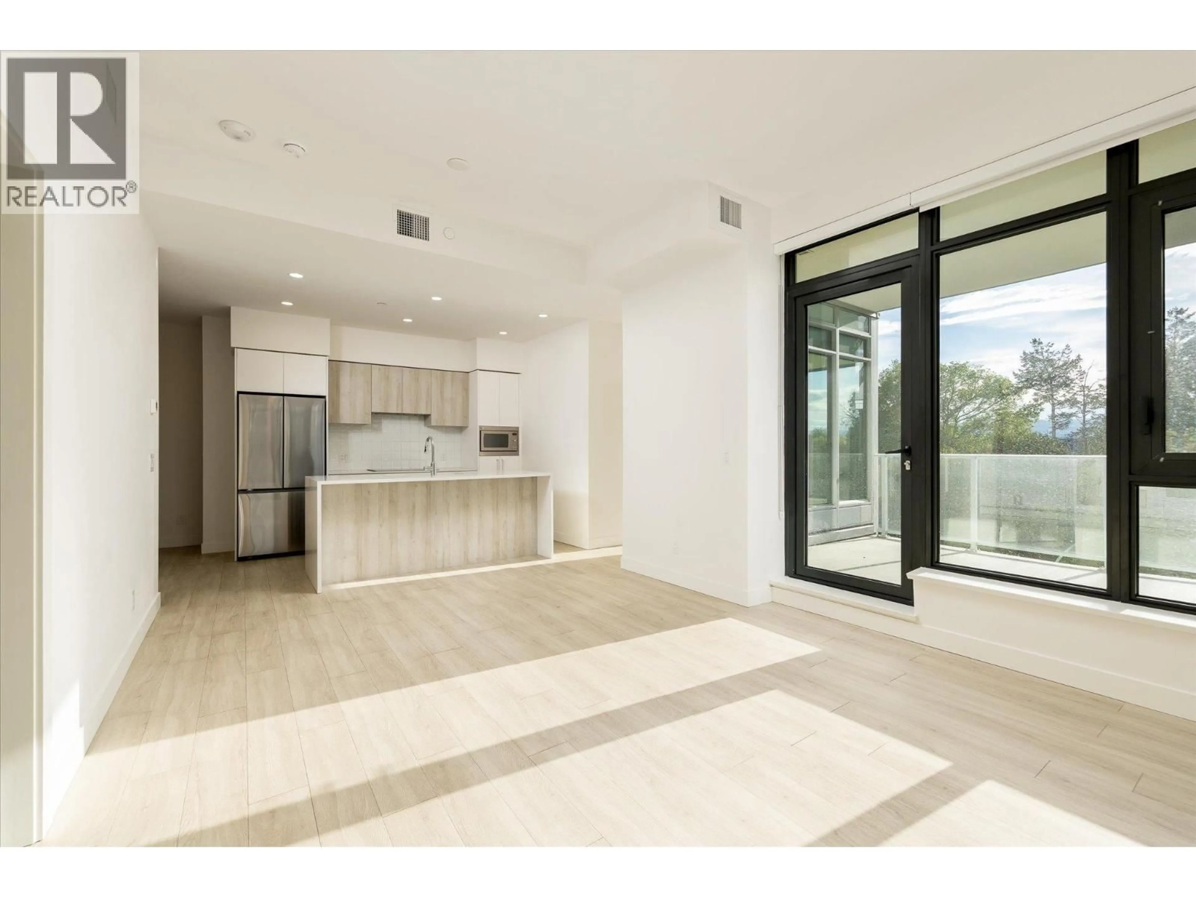 Open concept kitchen, unknown for 408 - 3699 CAPOZZI ROAD, Kelowna British Columbia V1W3L2