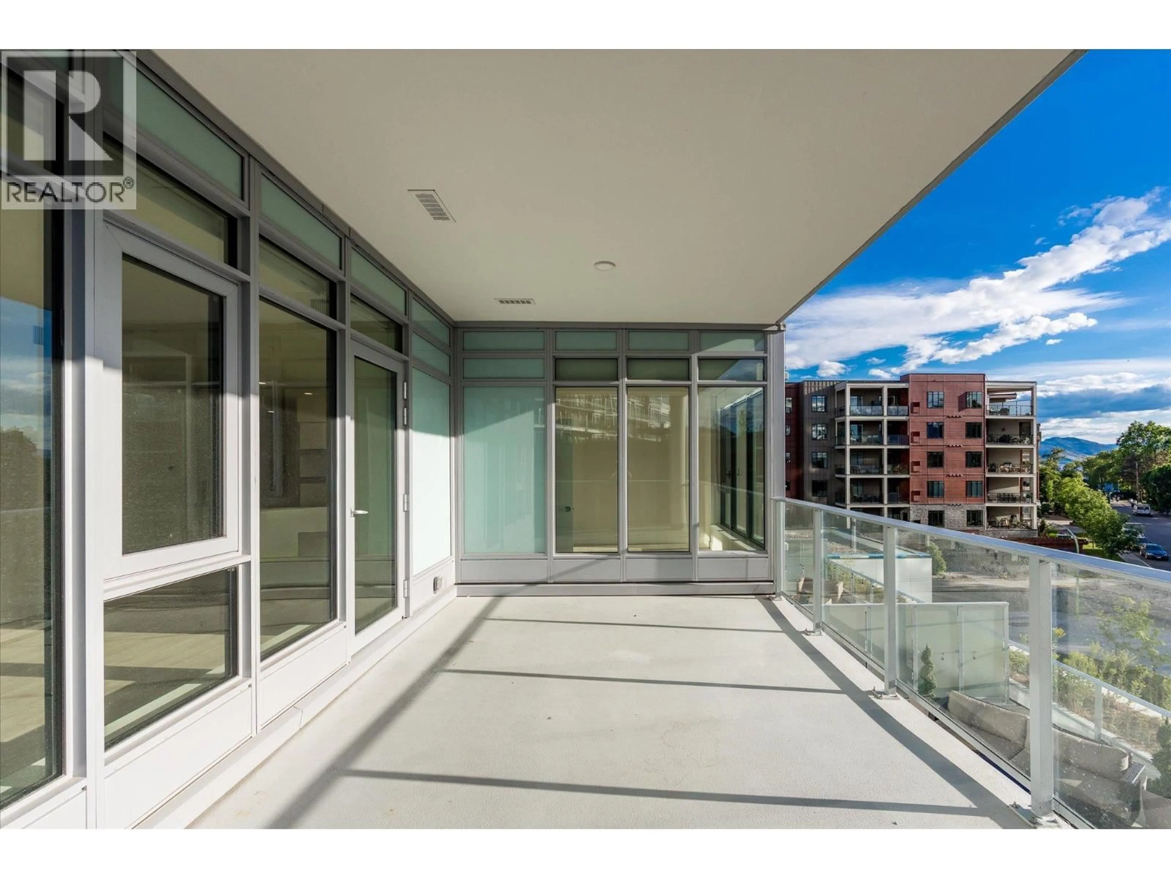 Indoor foyer for 408 - 3699 CAPOZZI ROAD, Kelowna British Columbia V1W3L2