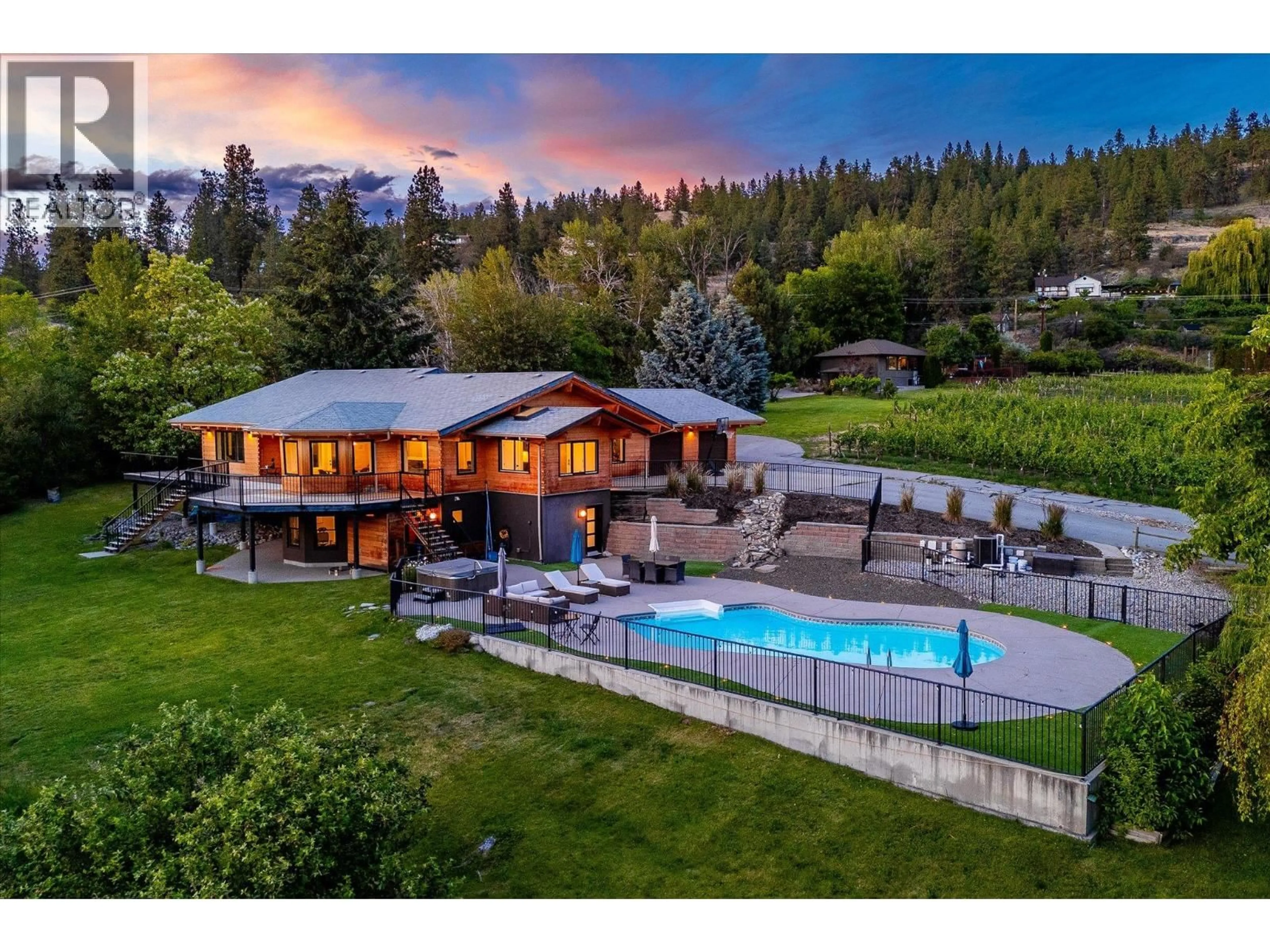 A pic from outside/outdoor area/front of a property/back of a property/a pic from drone, water/lake/river/ocean view for 1055 PEARSON ROAD, Penticton British Columbia V2A8T9