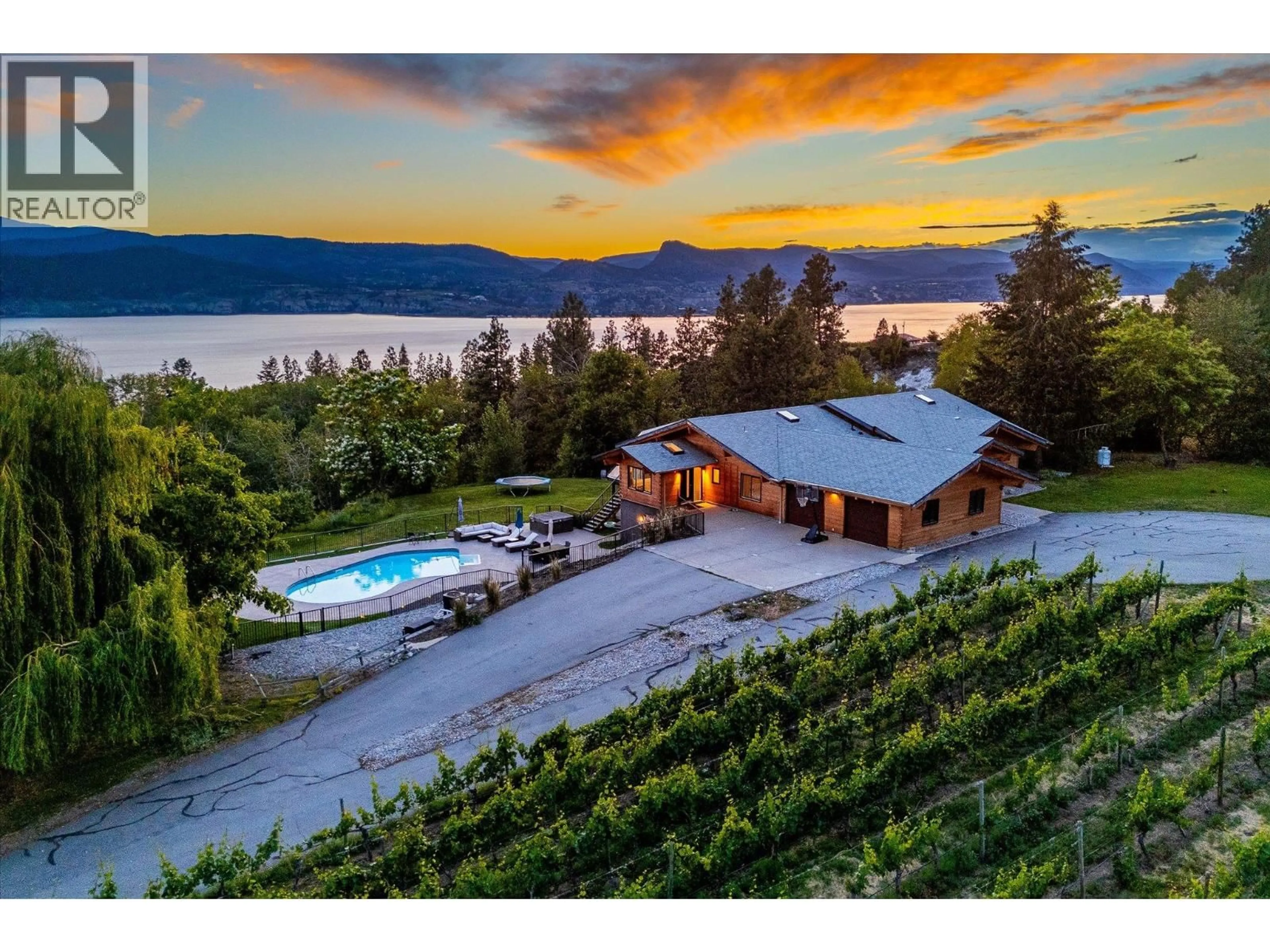 A pic from outside/outdoor area/front of a property/back of a property/a pic from drone, water/lake/river/ocean view for 1055 PEARSON ROAD, Penticton British Columbia V2A8T9