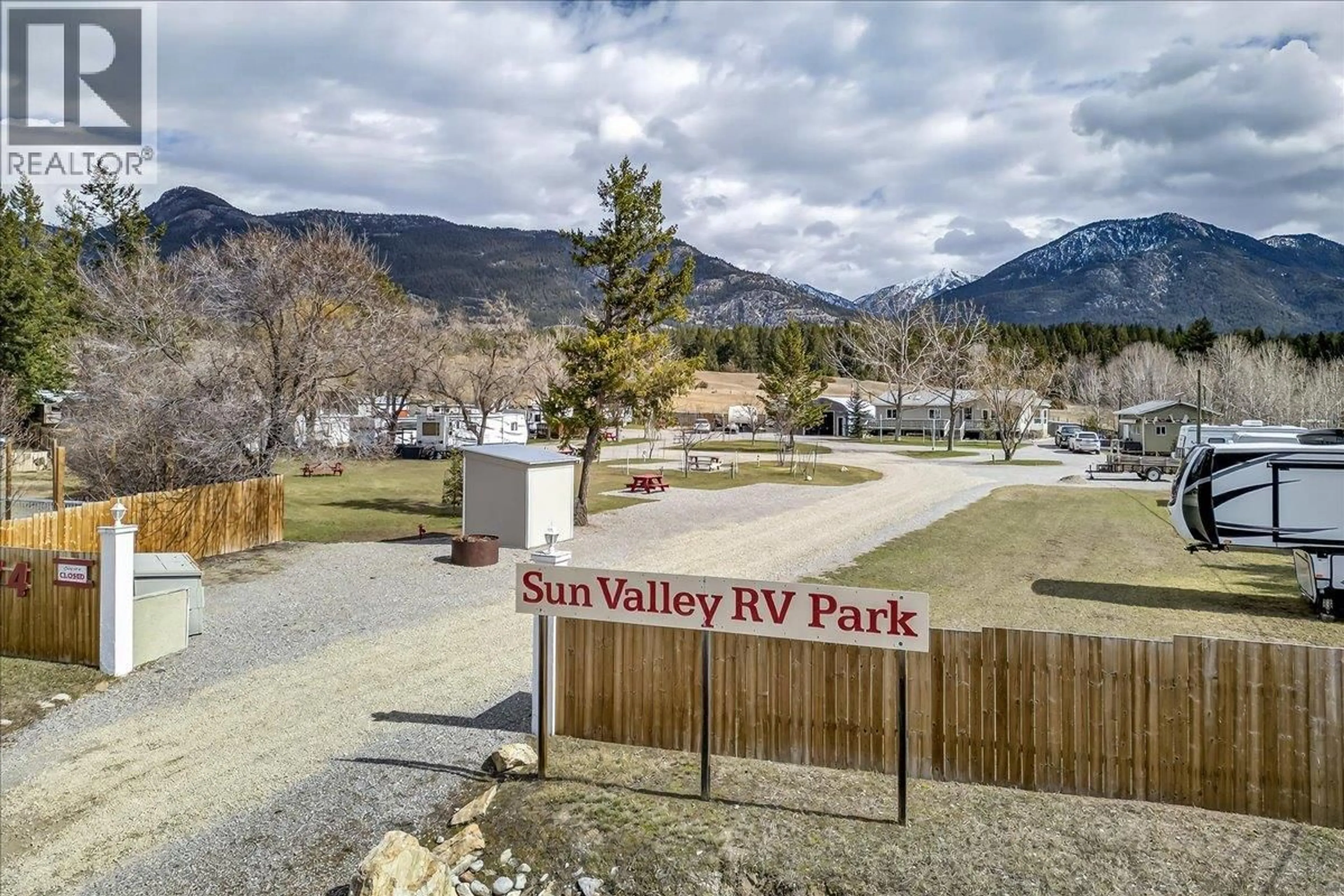 A pic from outside/outdoor area/front of a property/back of a property/a pic from drone, mountain view for 1474 93 95 HIGHWAY, Windermere British Columbia V0B2L1