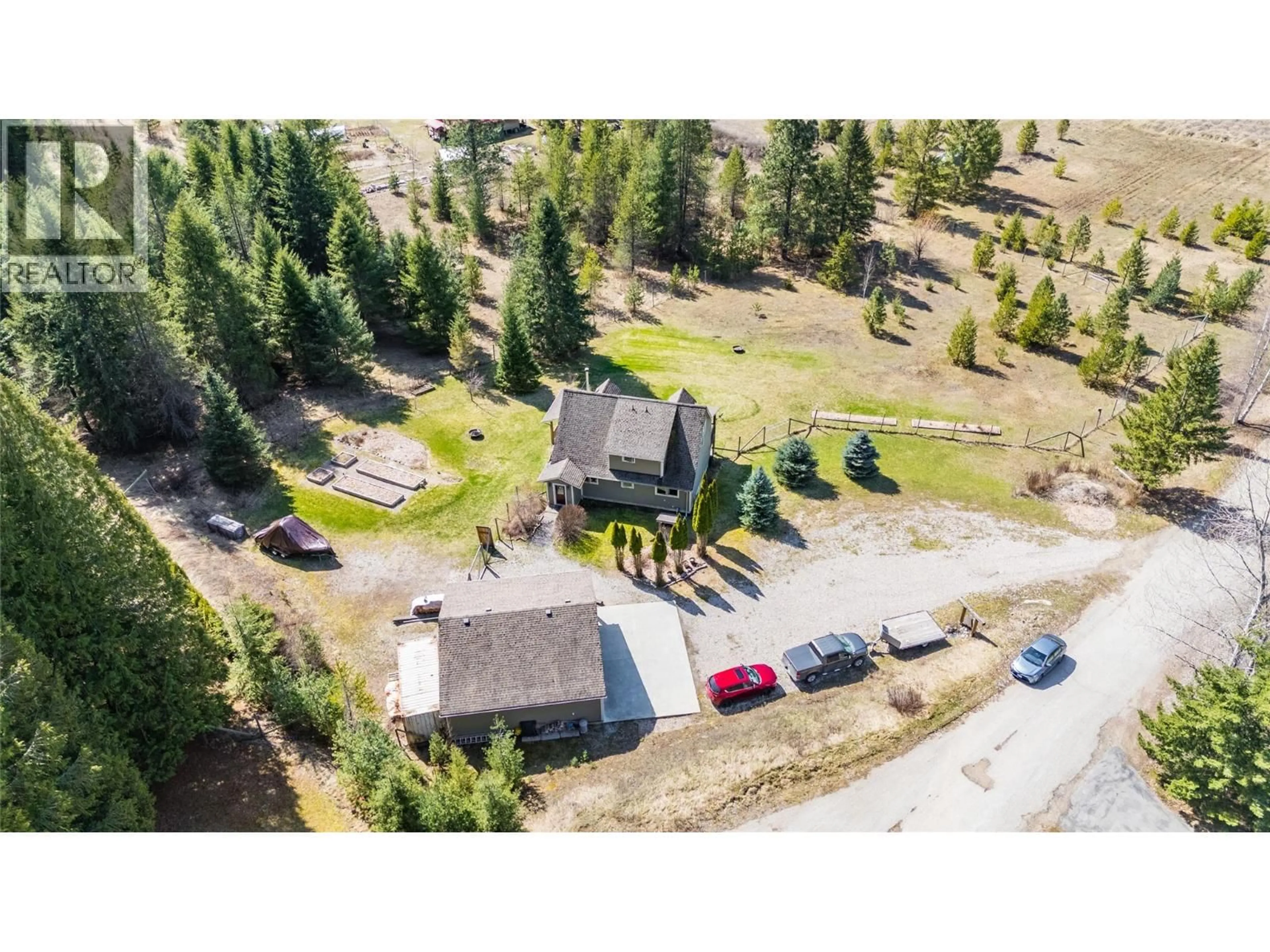 A pic from outside/outdoor area/front of a property/back of a property/a pic from drone, mountain view for 955 CEDAR BRAE ROAD, Glade British Columbia V1N4R5