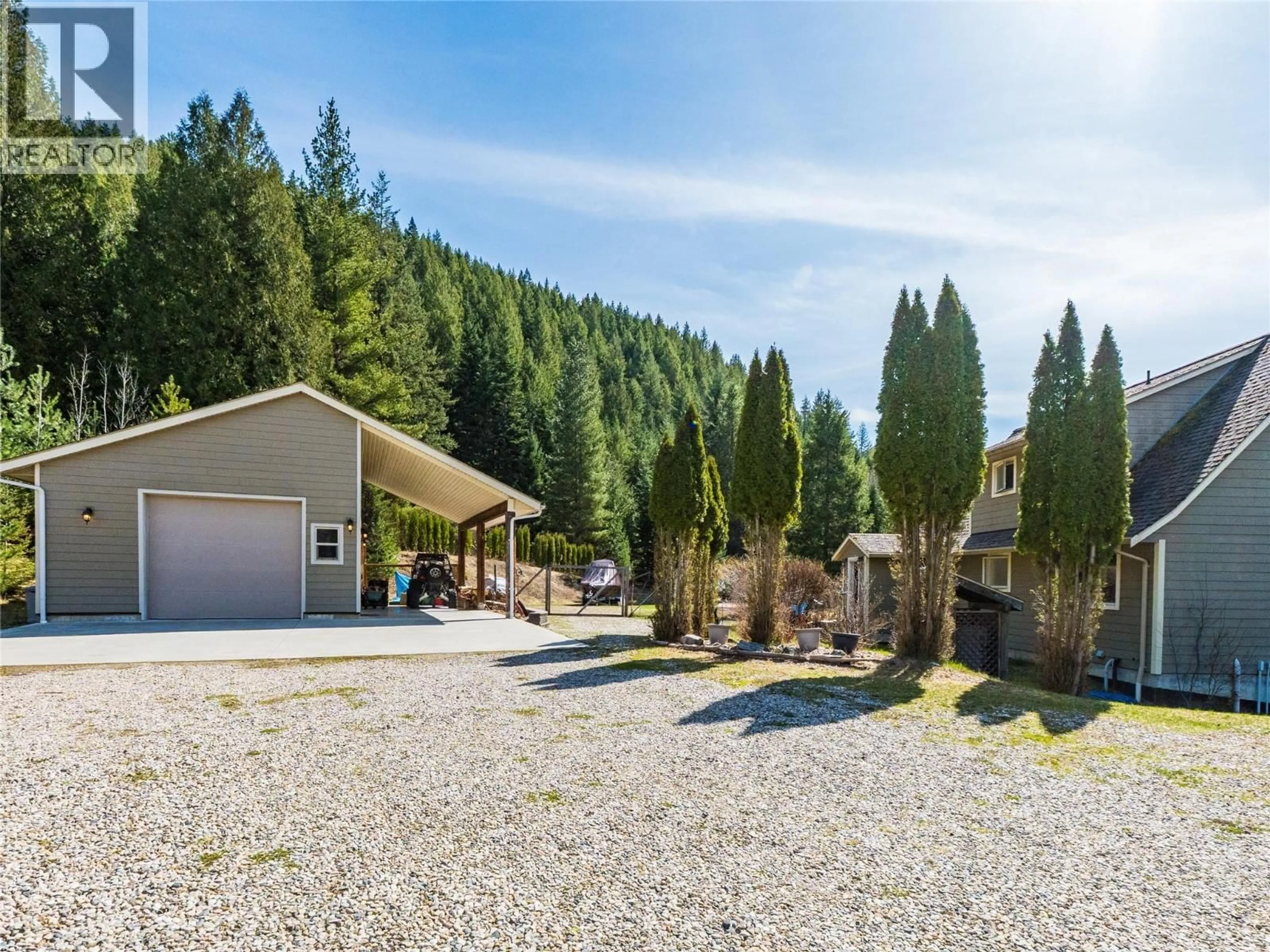 A pic from outside/outdoor area/front of a property/back of a property/a pic from drone, mountain view for 955 CEDAR BRAE ROAD, Glade British Columbia V1N4R5