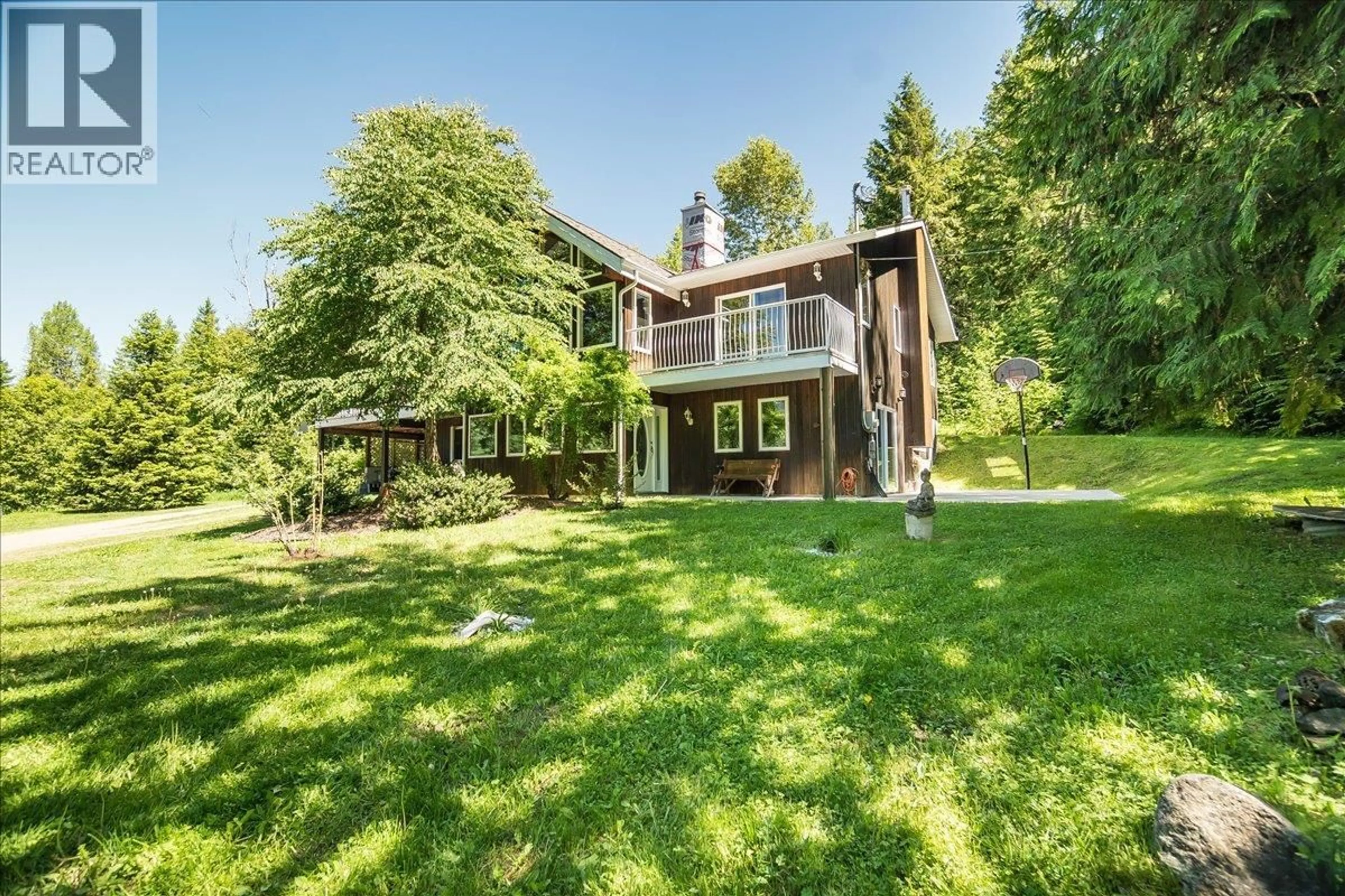 A pic from outside/outdoor area/front of a property/back of a property/a pic from drone, water/lake/river/ocean view for 4399 BIRD CREEK ROAD, Nelson British Columbia V1L6X2