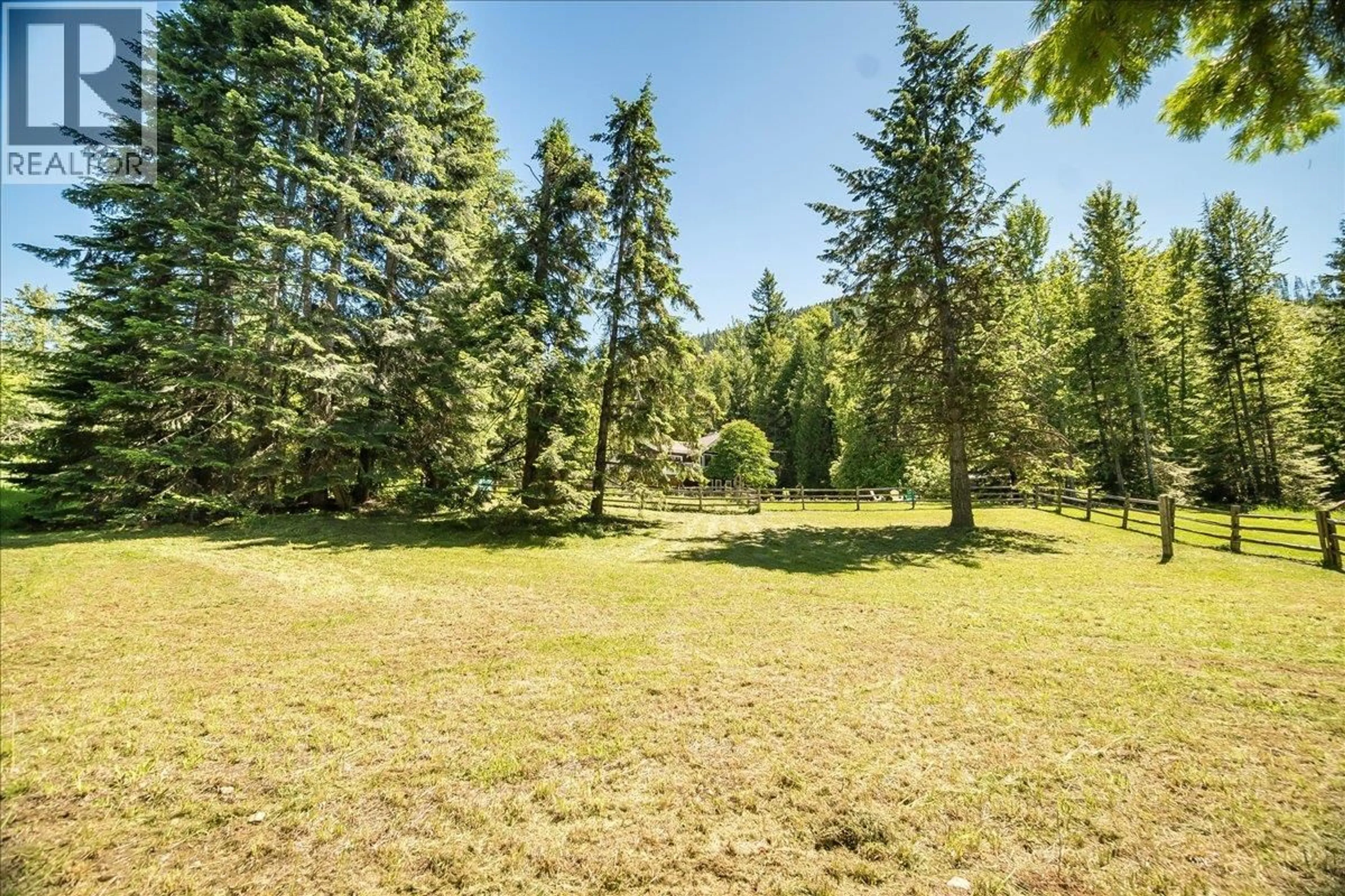 A pic from outside/outdoor area/front of a property/back of a property/a pic from drone, forest/trees view for 4399 BIRD CREEK ROAD, Nelson British Columbia V1L6X2