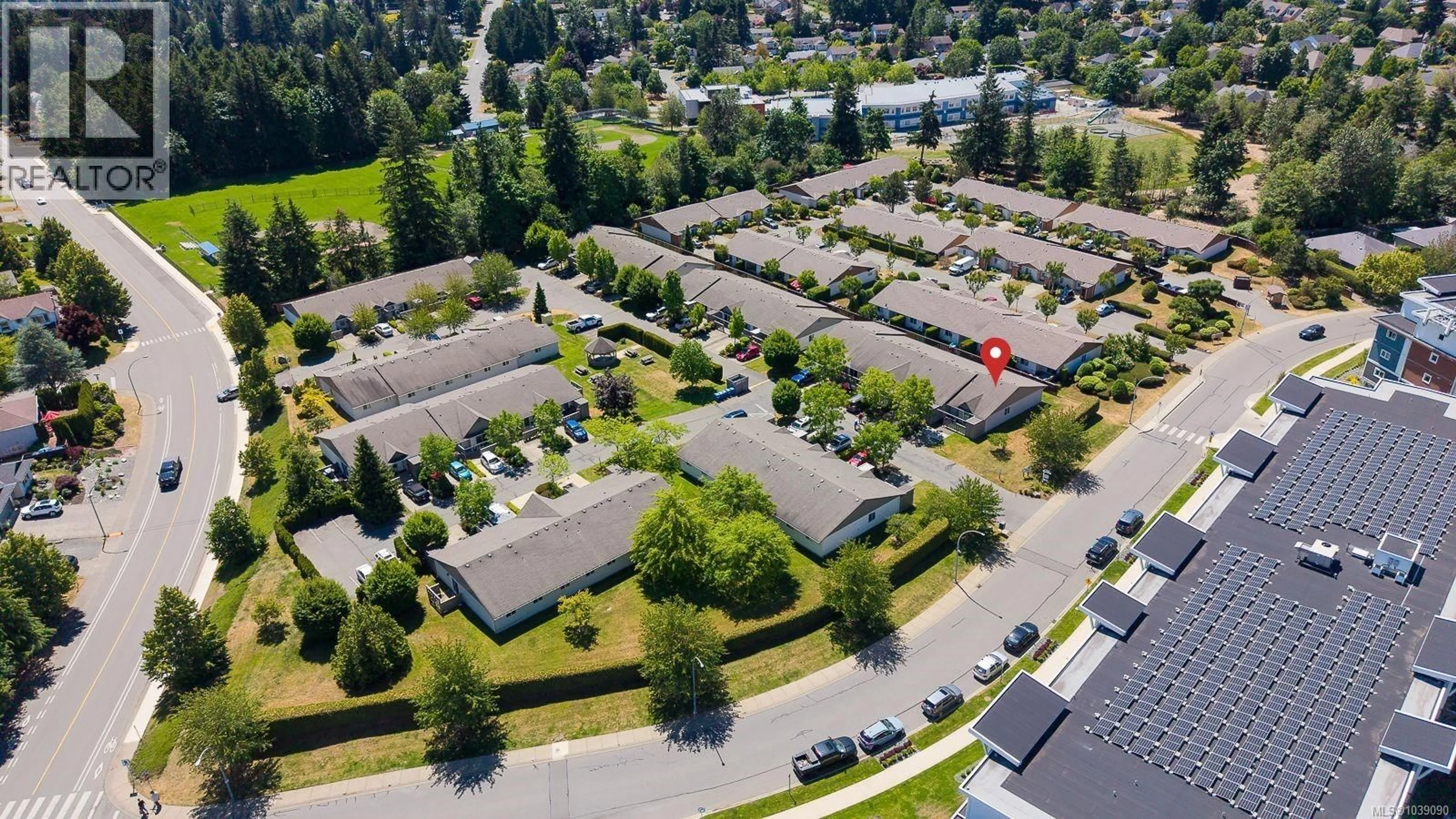 A pic from outside/outdoor area/front of a property/back of a property/a pic from drone, unknown for 125 - 2191 MURRELET DRIVE, Comox British Columbia V9M3Y1