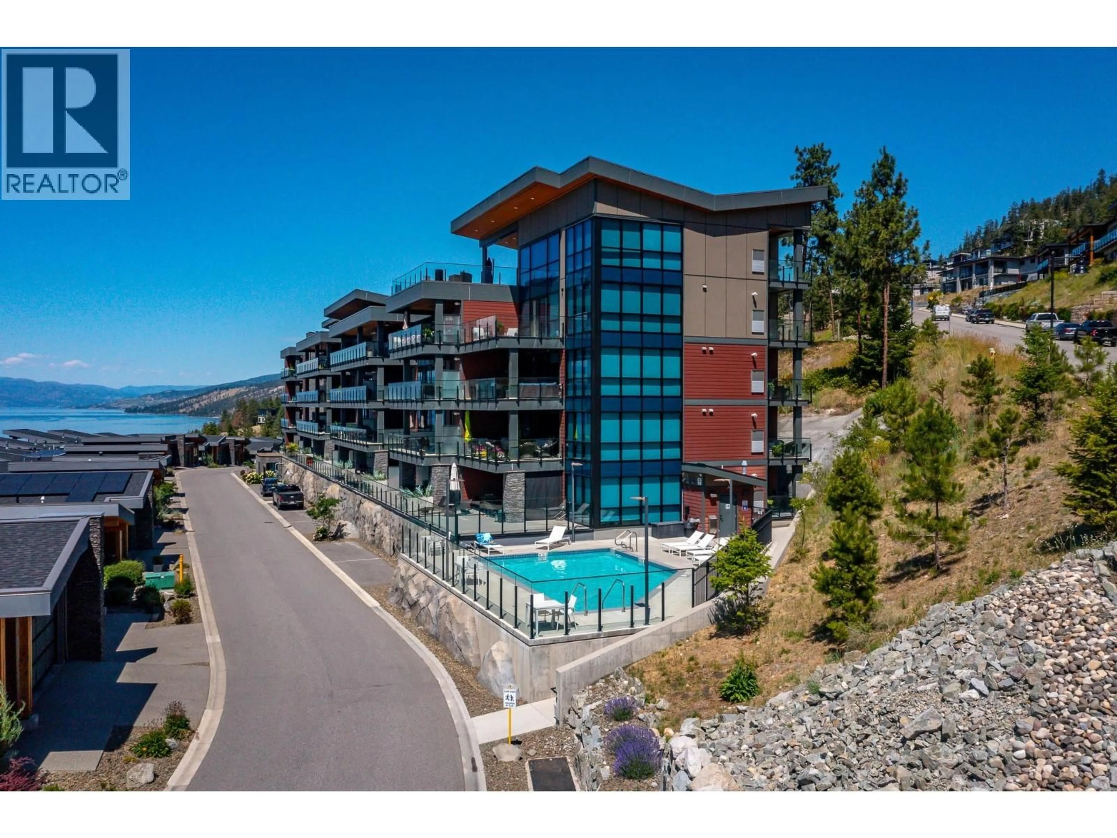 A pic from outside/outdoor area/front of a property/back of a property/a pic from drone, water/lake/river/ocean view for 211 - 3475 GRANITE CLOSE, Kelowna British Columbia V1V0B9