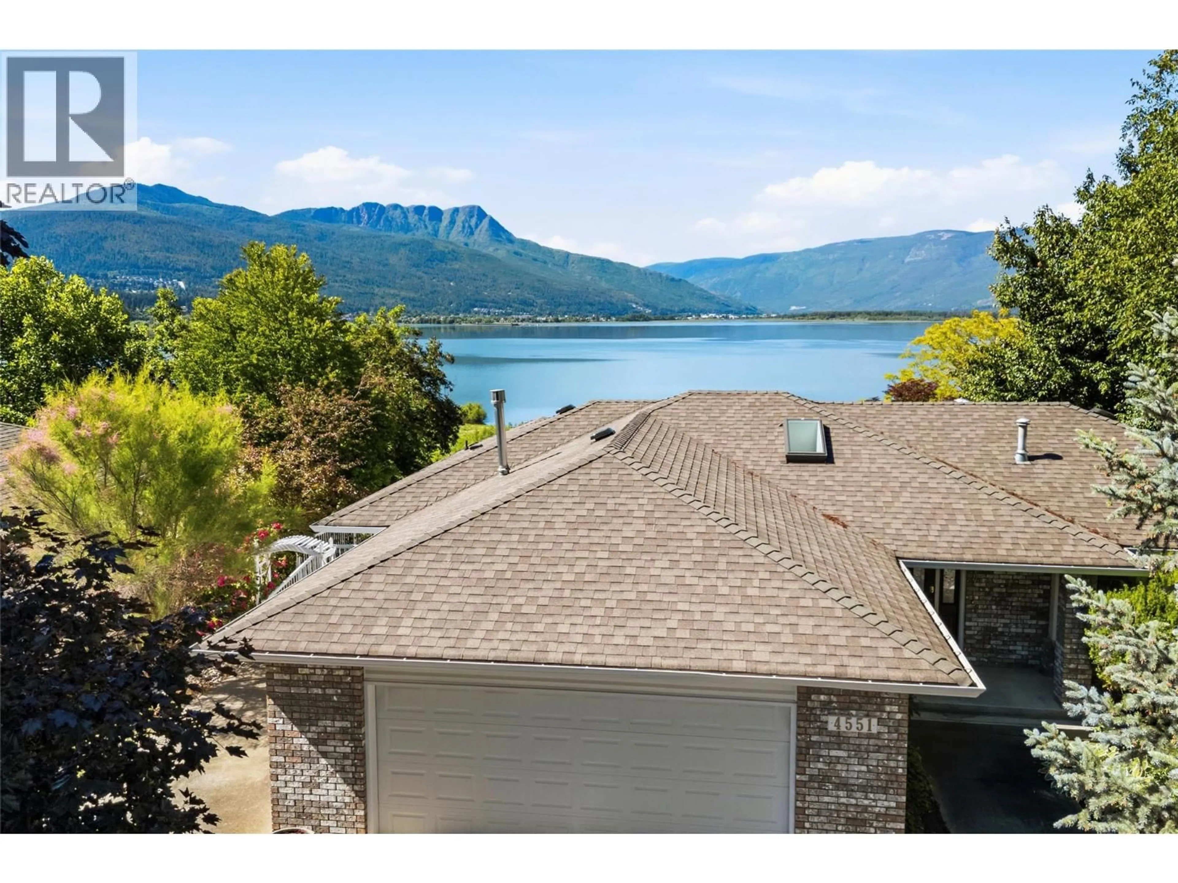 A pic from outside/outdoor area/front of a property/back of a property/a pic from drone, water/lake/river/ocean view for 4551 13 STREET NORTHEAST, Salmon Arm British Columbia V1E1E3