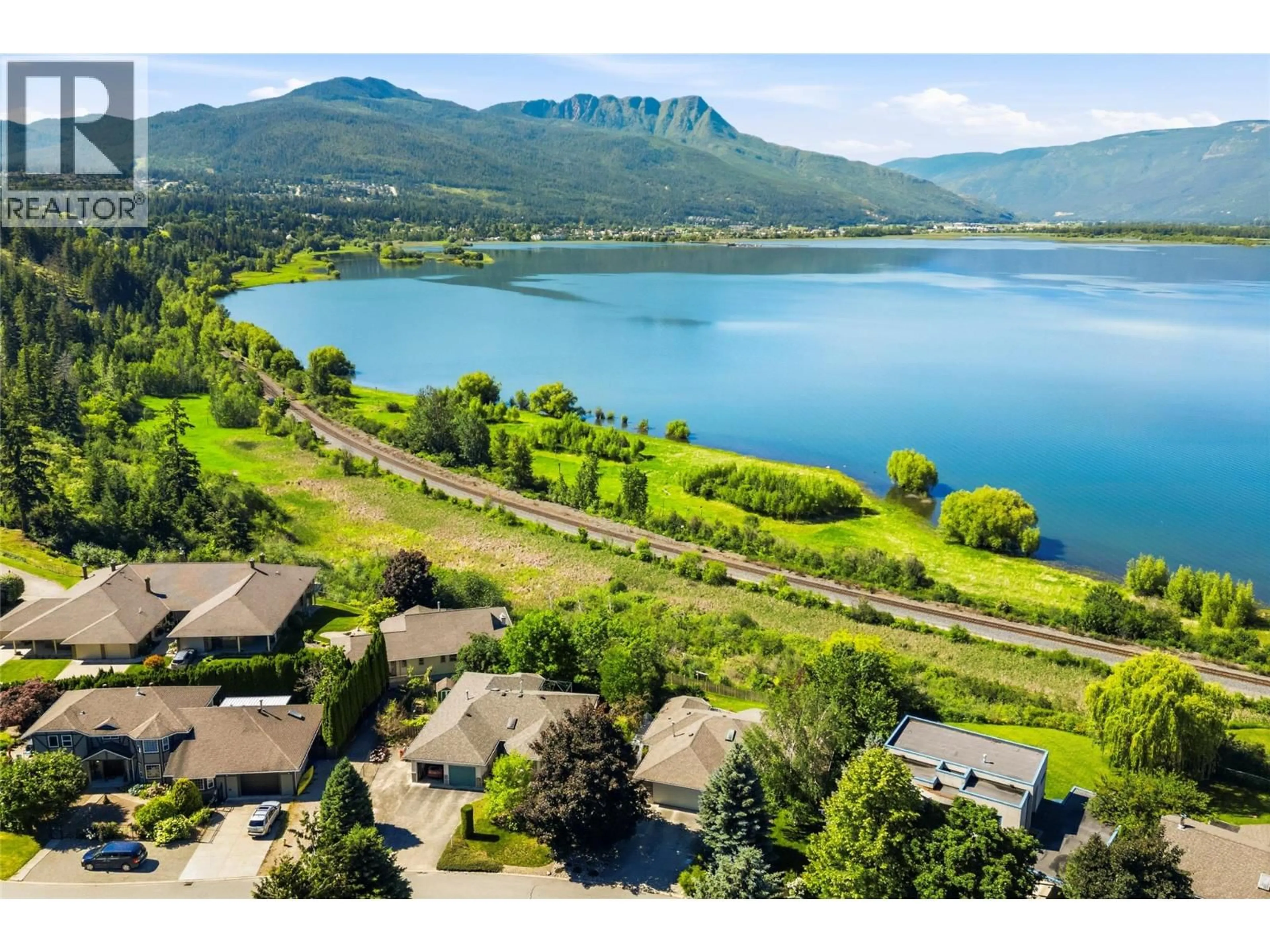A pic from outside/outdoor area/front of a property/back of a property/a pic from drone, water/lake/river/ocean view for 4551 13 STREET NORTHEAST, Salmon Arm British Columbia V1E1E3