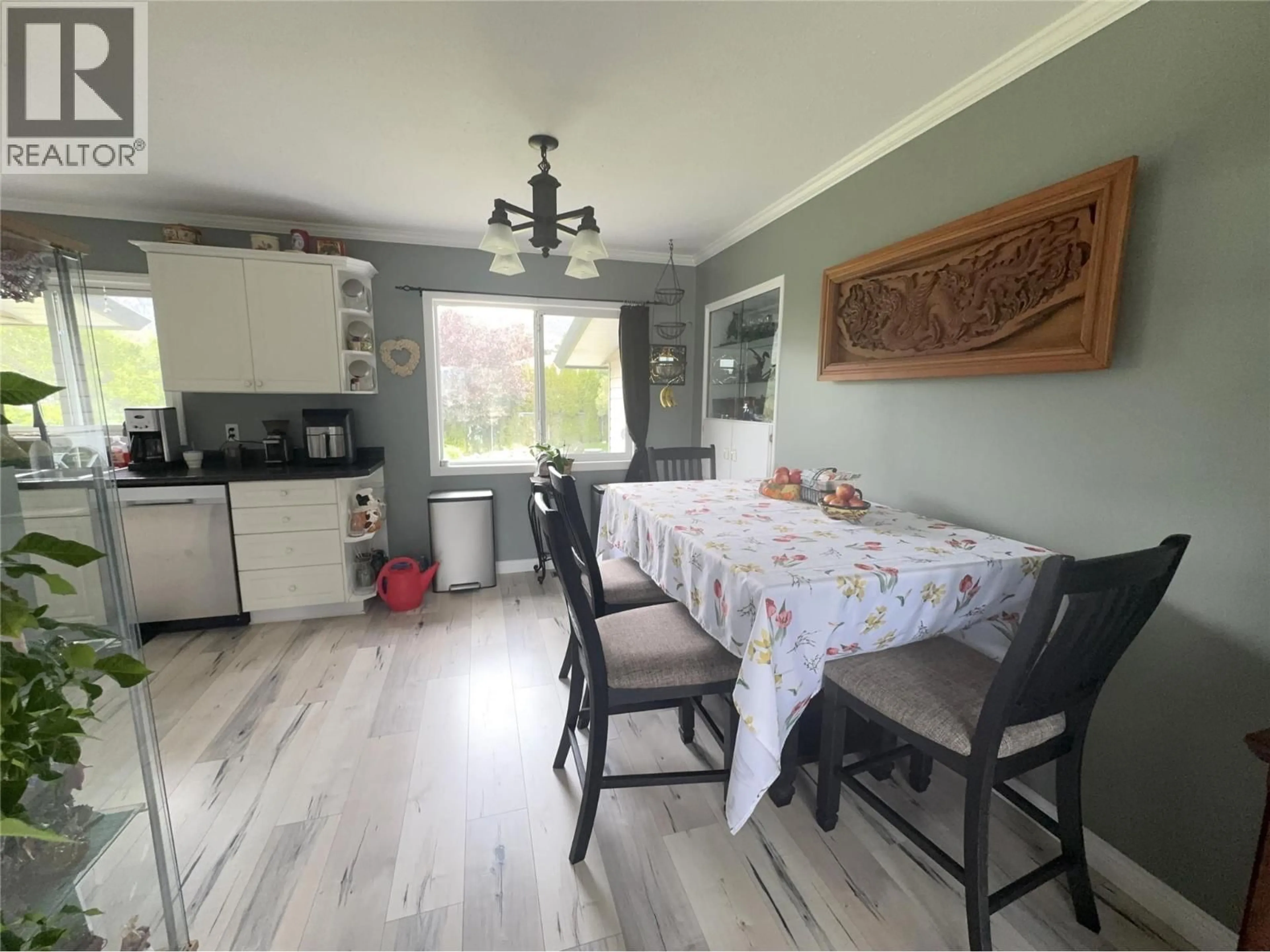 Dining room, wood/laminate floor for 2225 MERRITT AVENUE, Merritt British Columbia V1K1B8