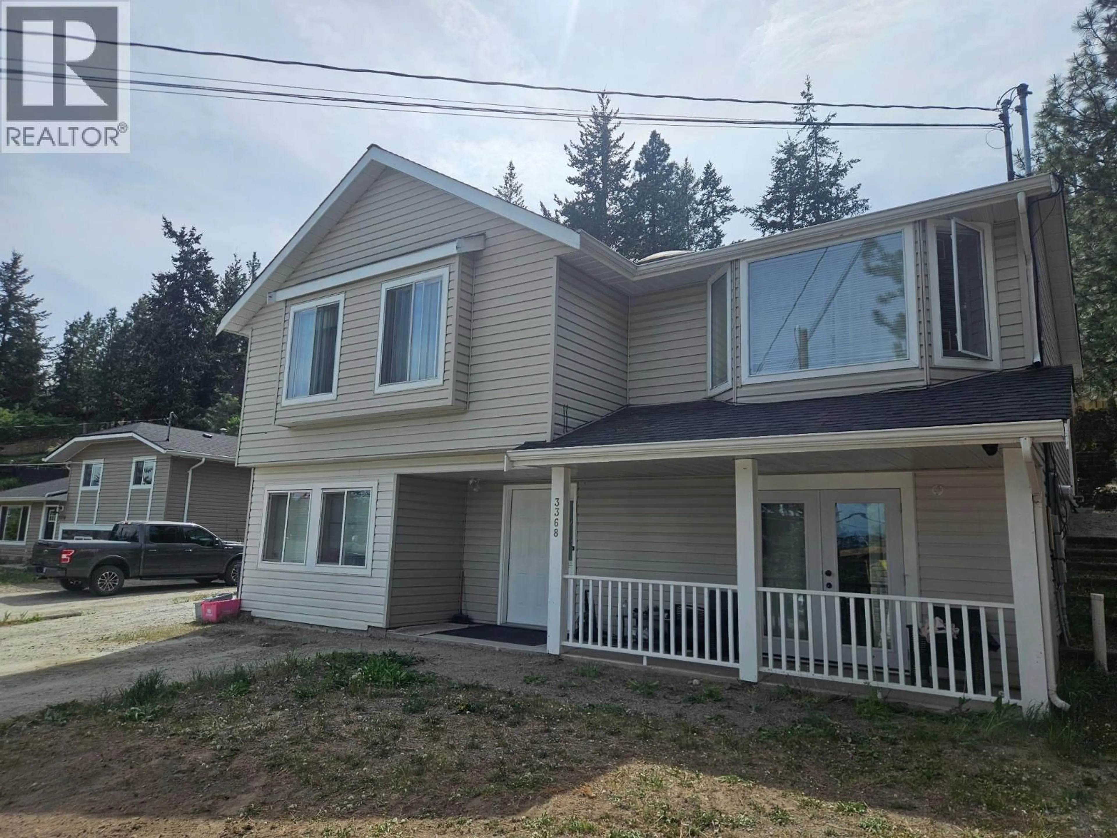 Home with vinyl exterior material, street for 3368 MCIVER ROAD, West Kelowna British Columbia V4T1G7