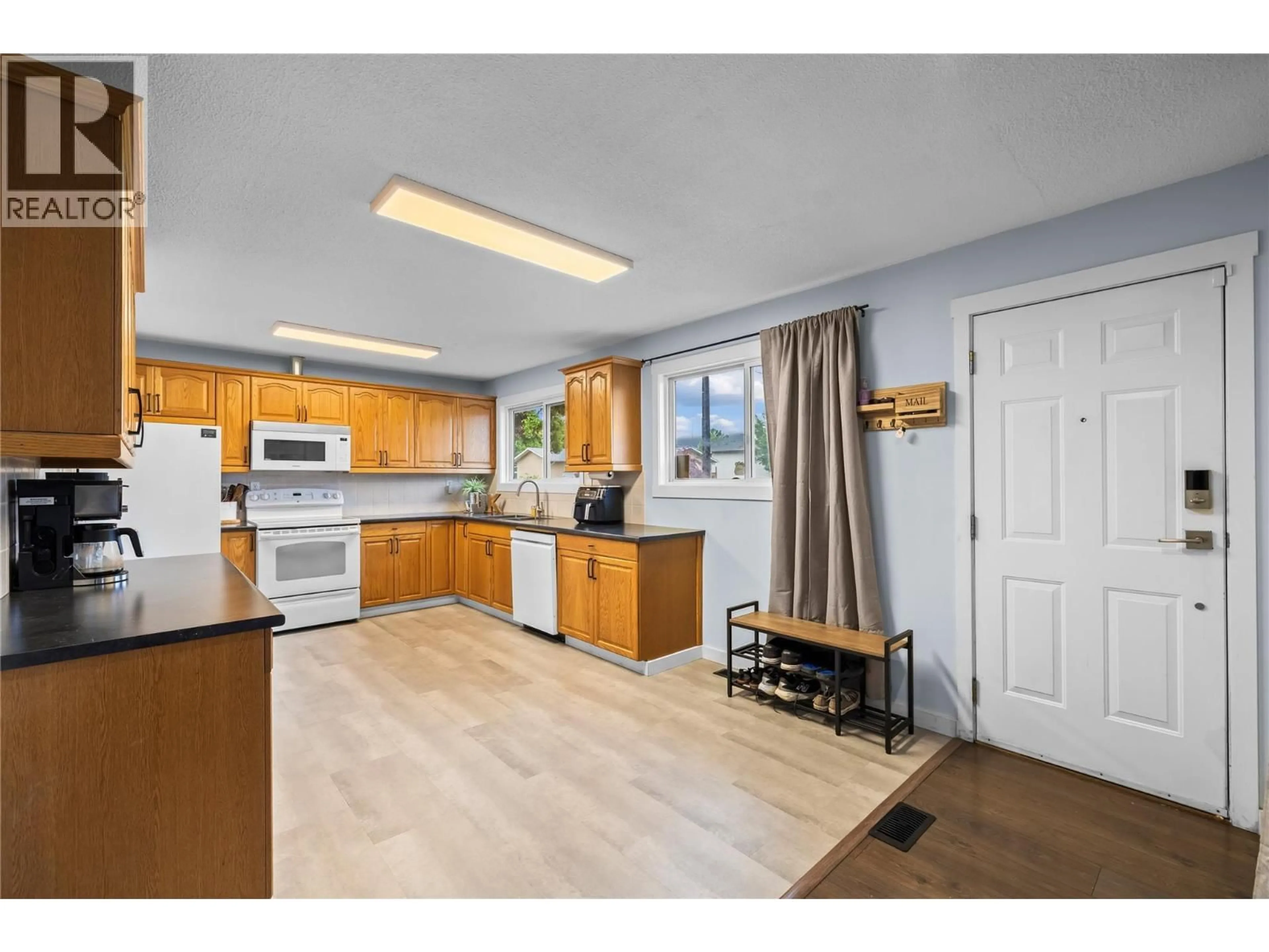 Standard kitchen, wood/laminate floor for 730 CUPAR ROAD, Kelowna British Columbia V1X1R6