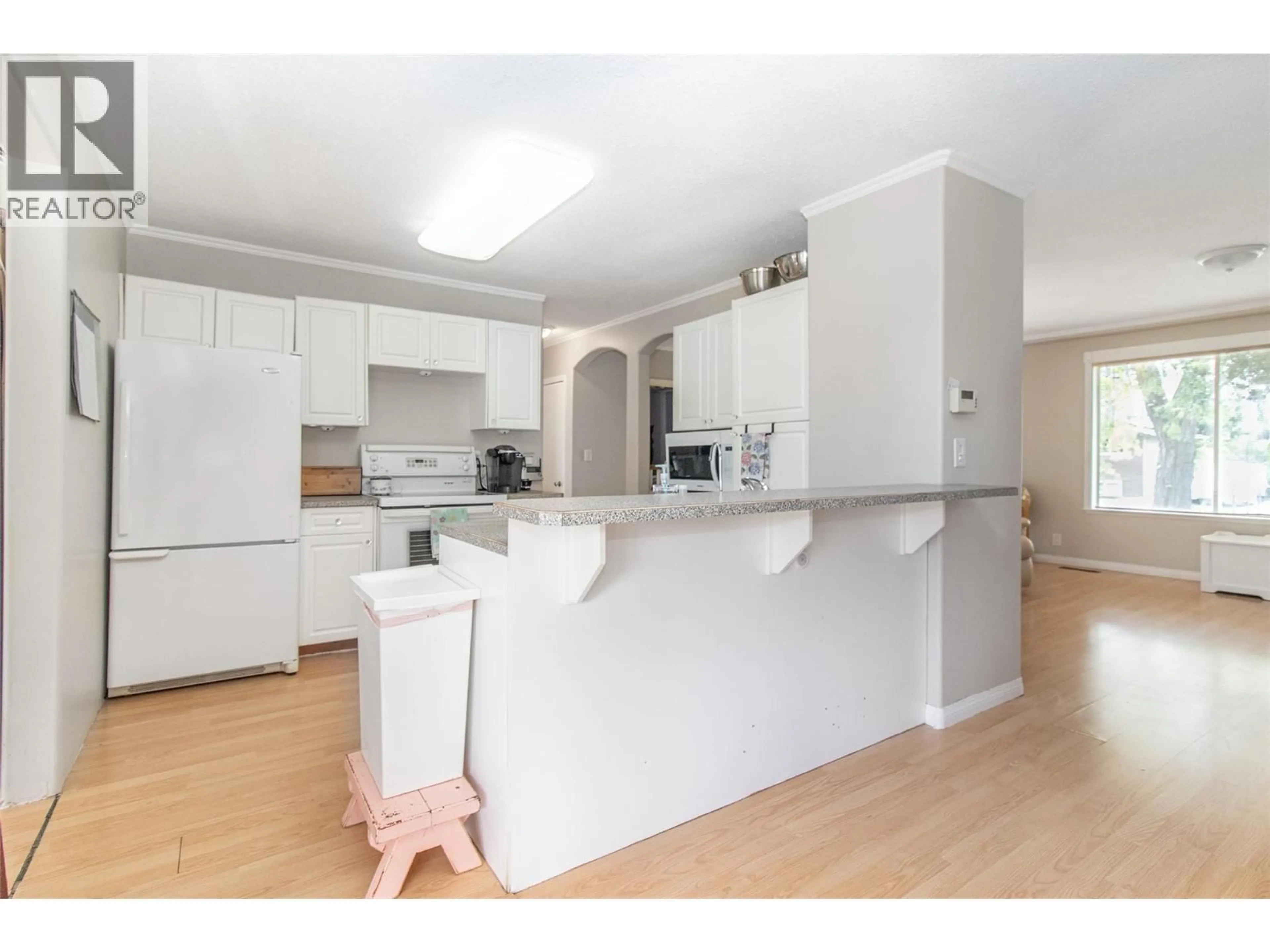 Standard kitchen, wood/laminate floor for 1381 MCBRIDE ROAD, Kelowna British Columbia V1Y4A5