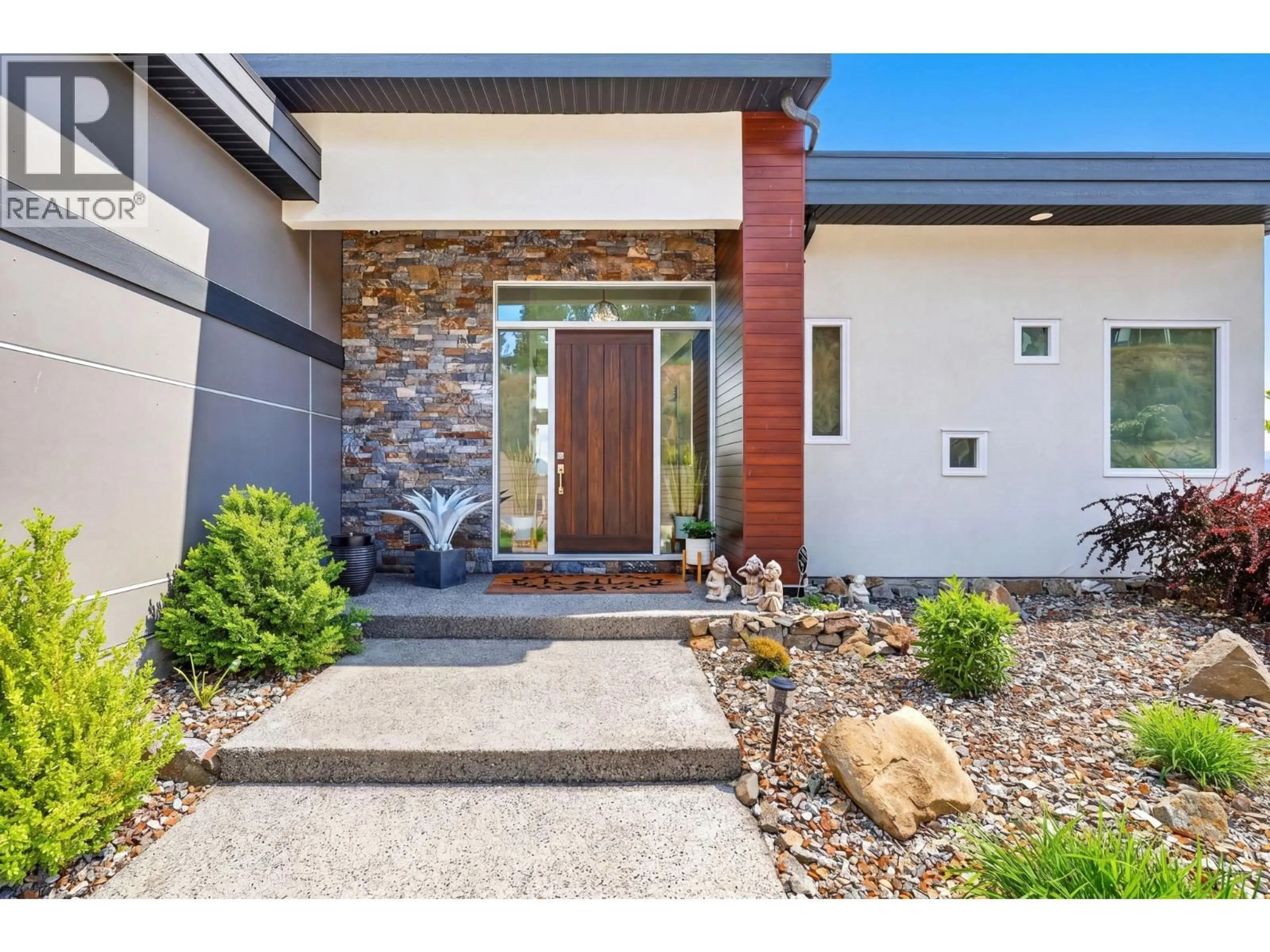 Home with brick exterior material, street for 8908 HAMPSHIRE CRESCENT, Vernon British Columbia V1H2K9