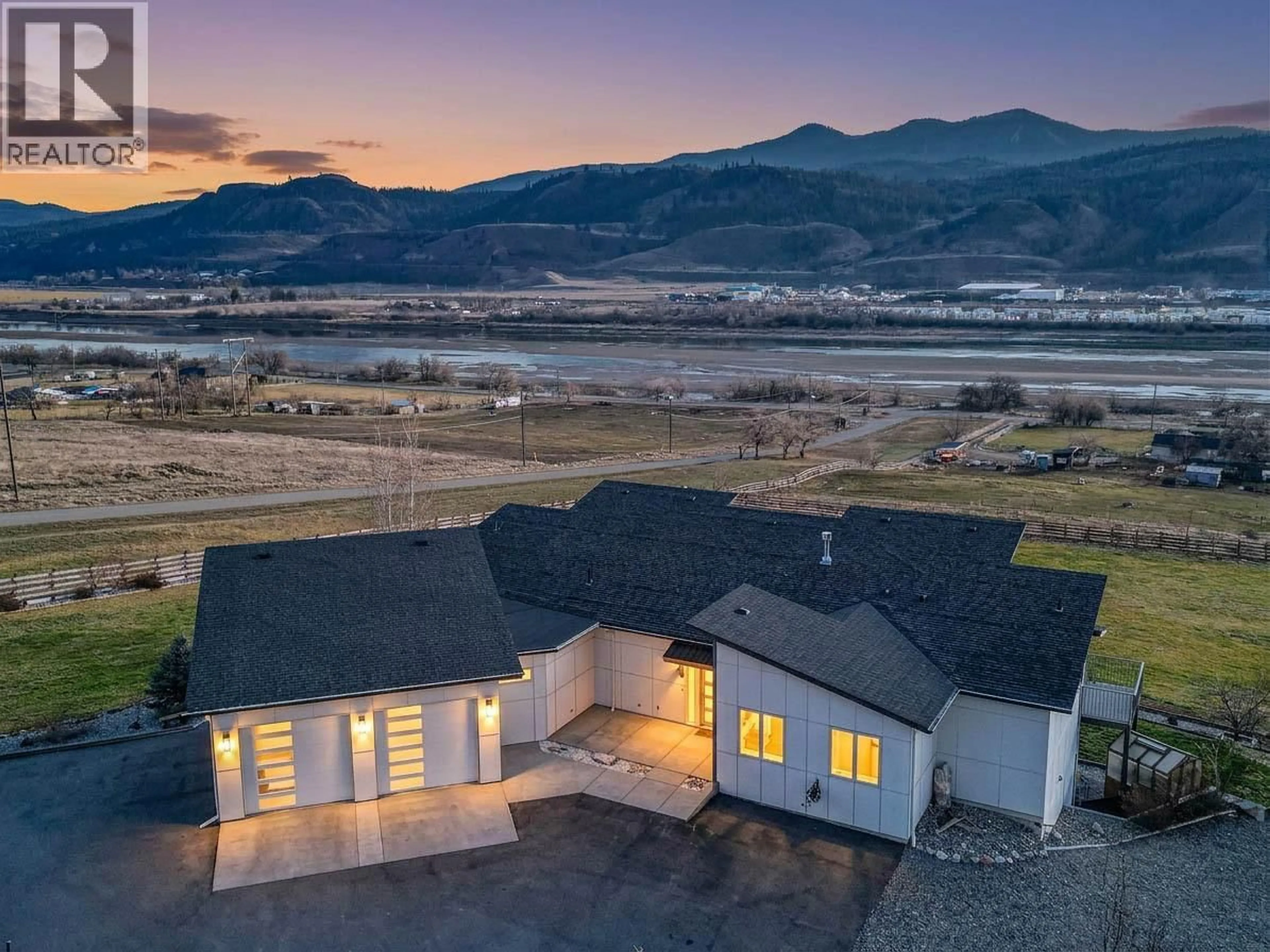 A pic from outside/outdoor area/front of a property/back of a property/a pic from drone, mountain view for 3093 SHUSWAP  E ROAD, Kamloops British Columbia V2H1T1