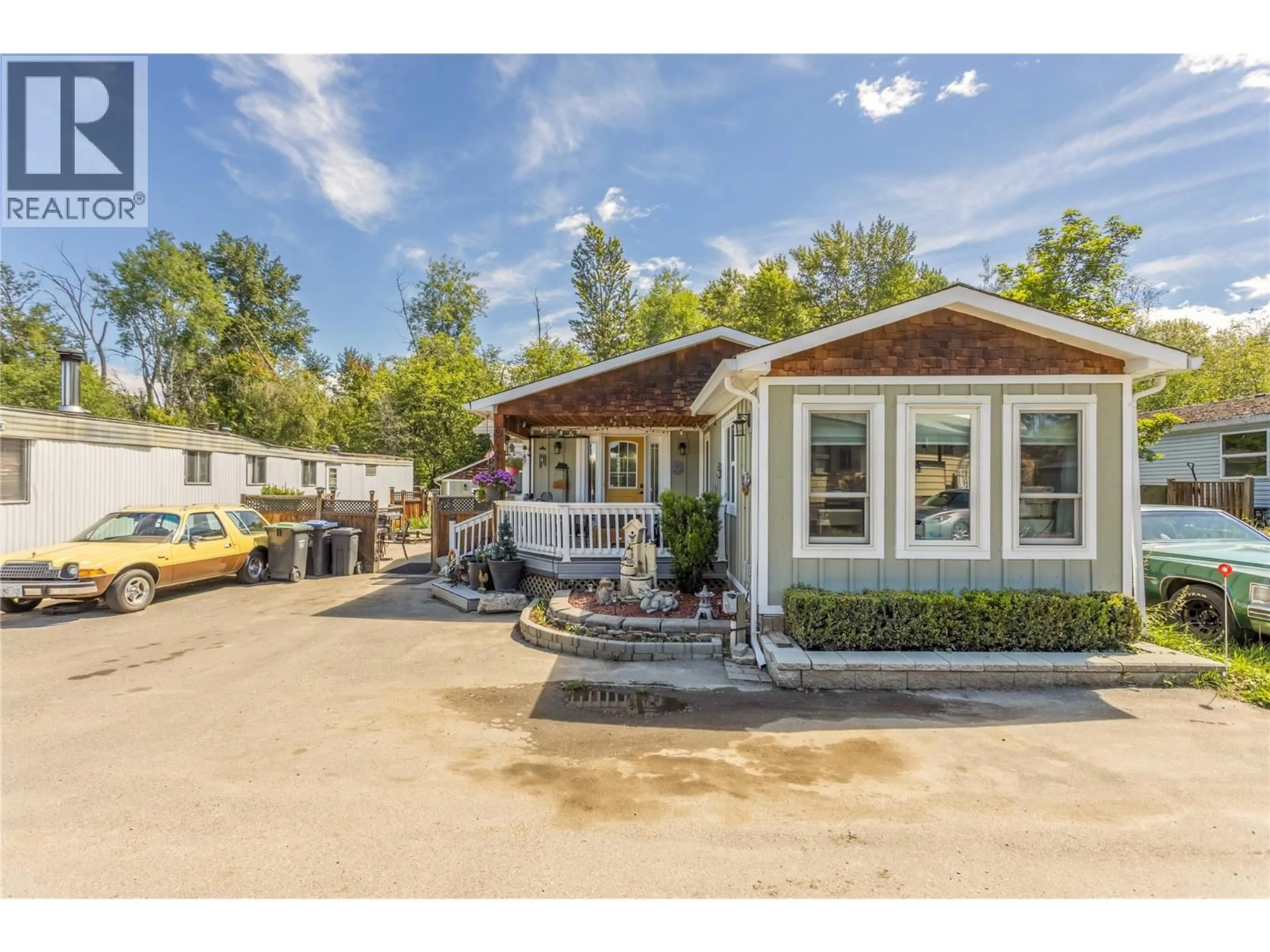 Home with vinyl exterior material, street for 8 - 4355 JAUD ROAD, Kelowna British Columbia V1W4R3