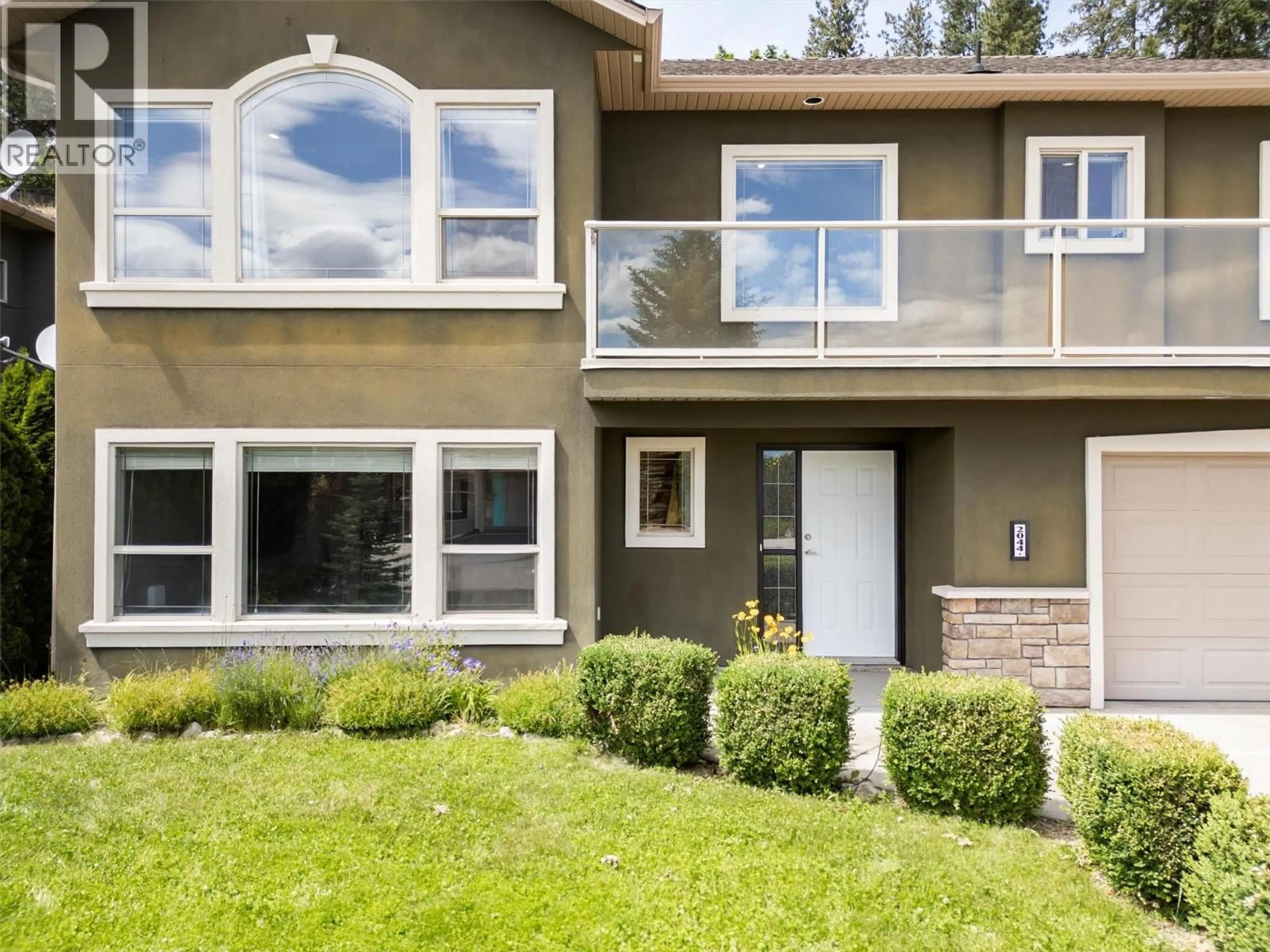 Home with vinyl exterior material, mountain view for 2044 SPYGLASS WAY, West Kelowna British Columbia V1Z3Z7