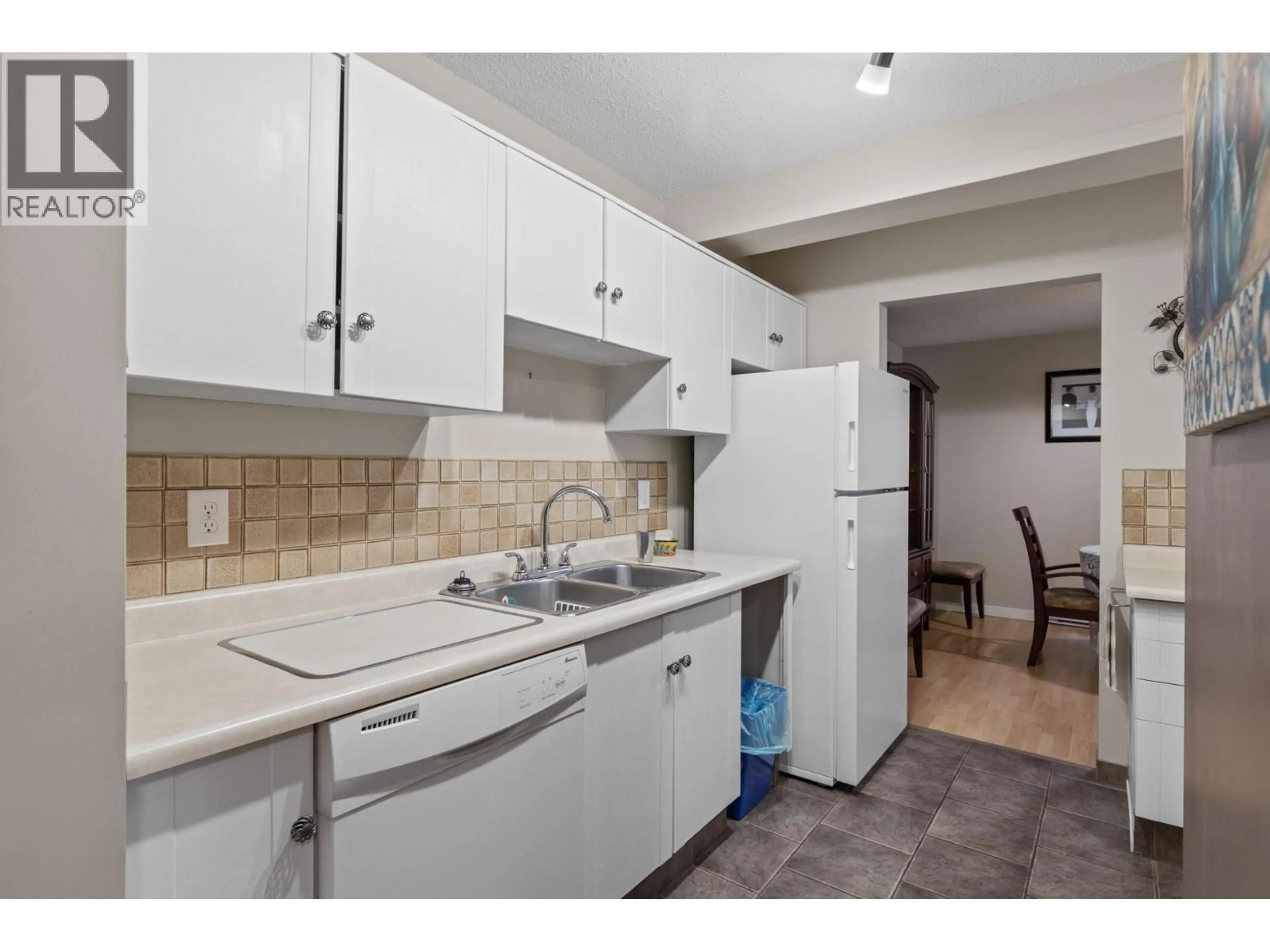 Standard kitchen, ceramic/tile floor for 108 - 1035 BERNARD AVENUE, Kelowna British Columbia V1Y6P7