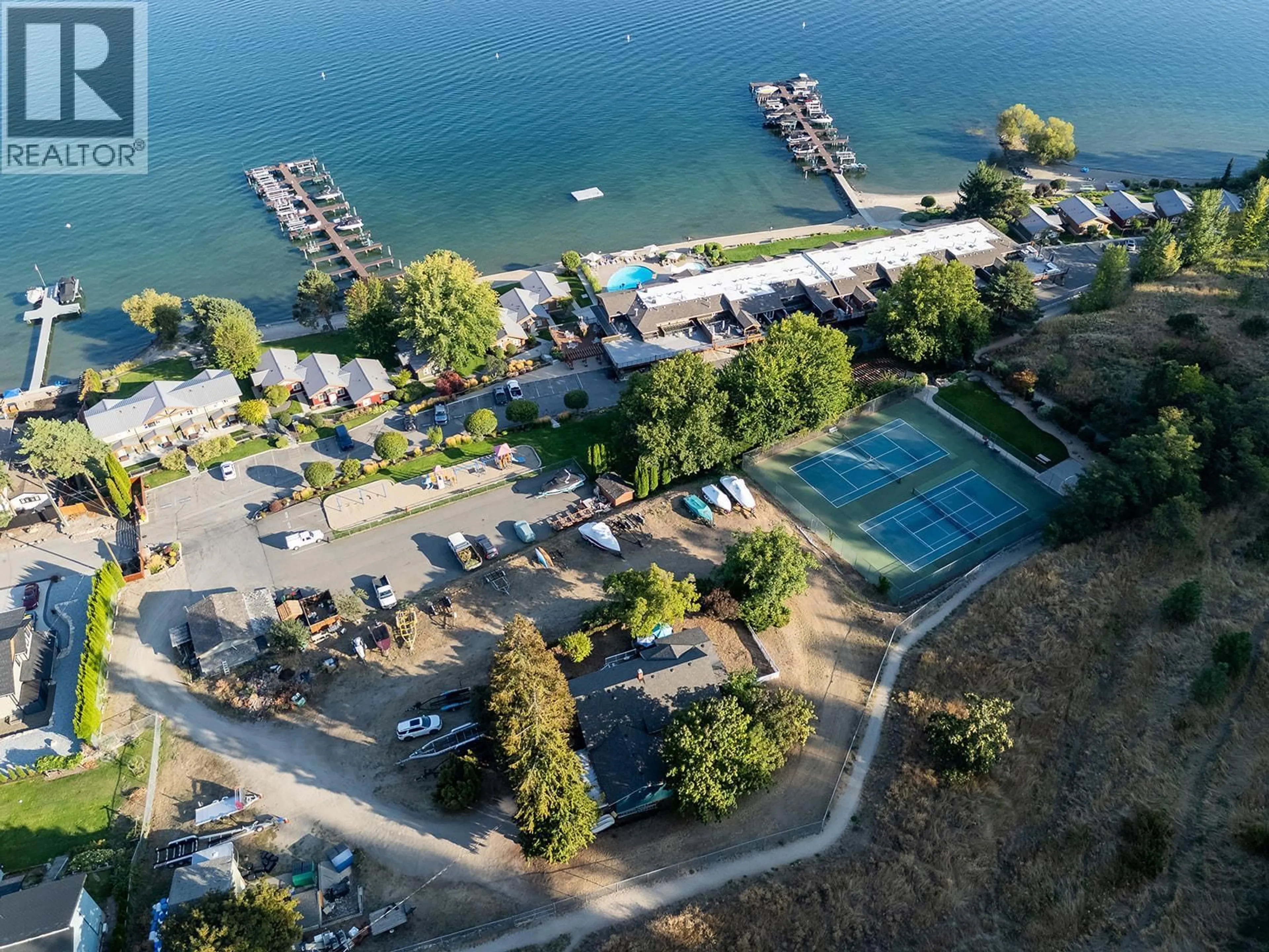 A pic from outside/outdoor area/front of a property/back of a property/a pic from drone, water/lake/river/ocean view for 301 - 2777 CASA LOMA ROAD, West Kelowna British Columbia V1Z1T6