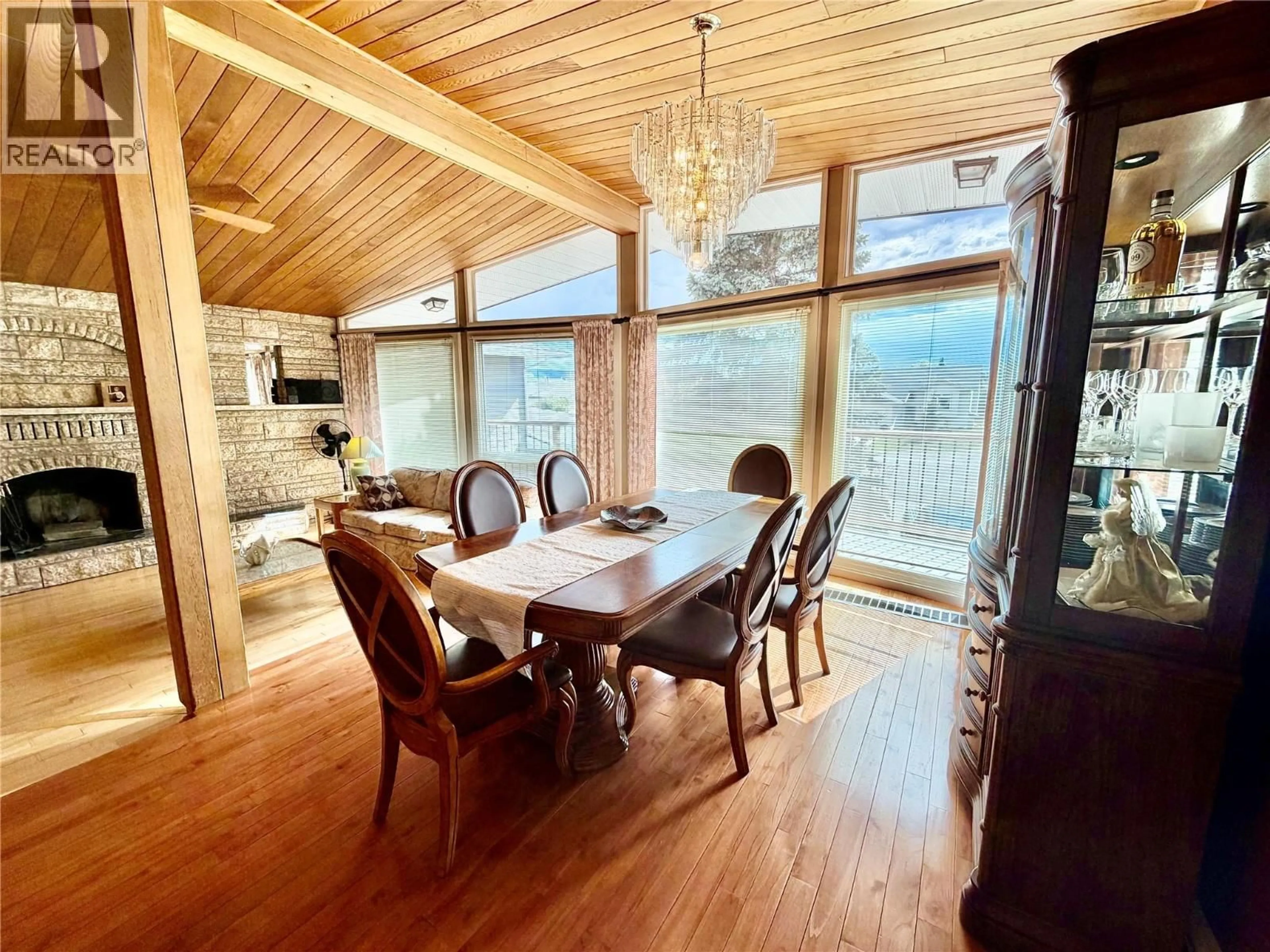 Dining room, wood/laminate floor for 10704 PINECREST LANE, Dawson Creek British Columbia V1G4M6