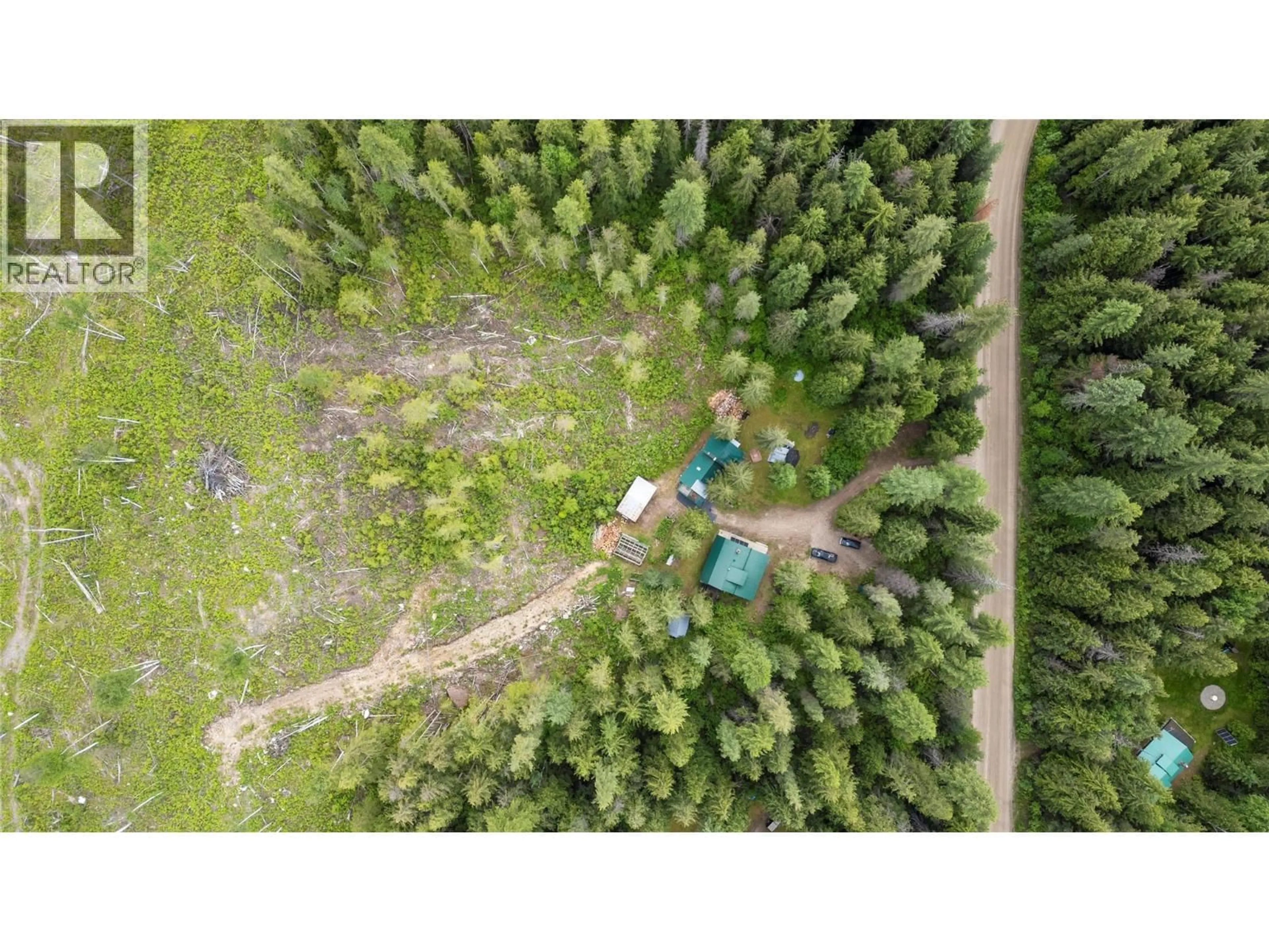 A pic from outside/outdoor area/front of a property/back of a property/a pic from drone, forest/trees view for 1598 QUAST ROAD, Seymour Arm British Columbia V0E2V2