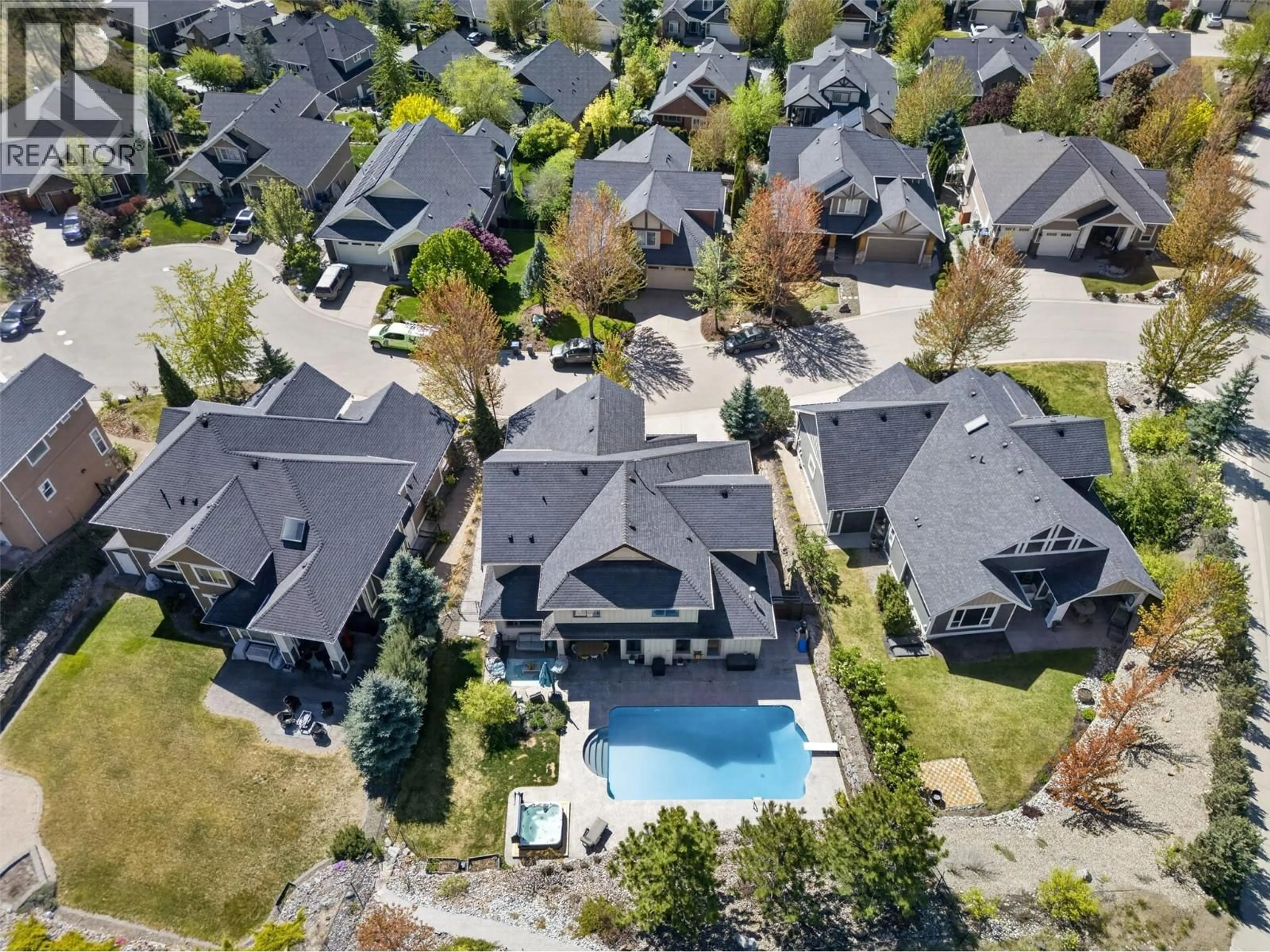 A pic from outside/outdoor area/front of a property/back of a property/a pic from drone, street for 1996 TWIN RIDGE COURT, Kelowna British Columbia V1V2X8