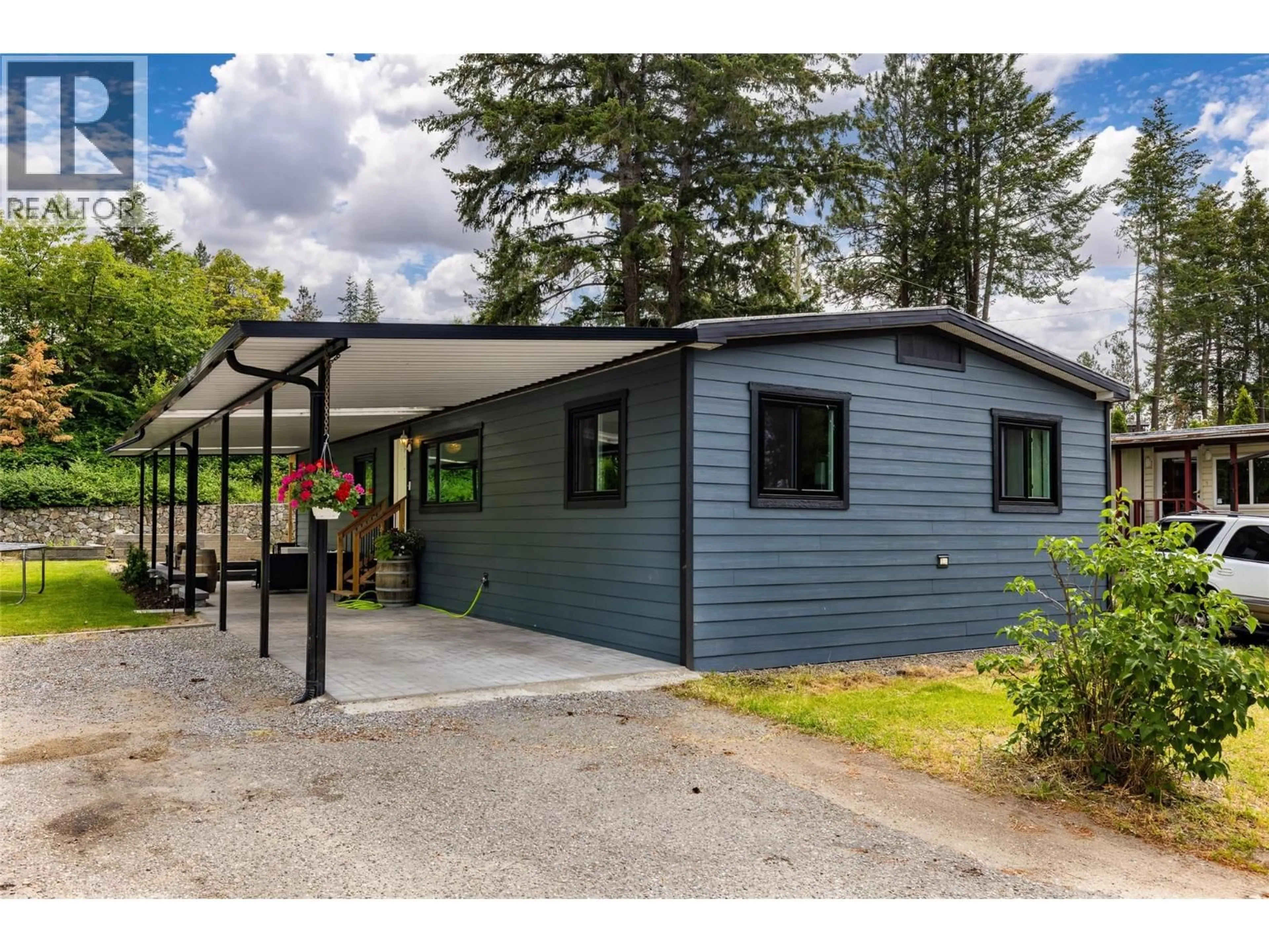 Home with vinyl exterior material, street for 41 - 4075 MCCLAIN ROAD, Kelowna British Columbia V1W4R4
