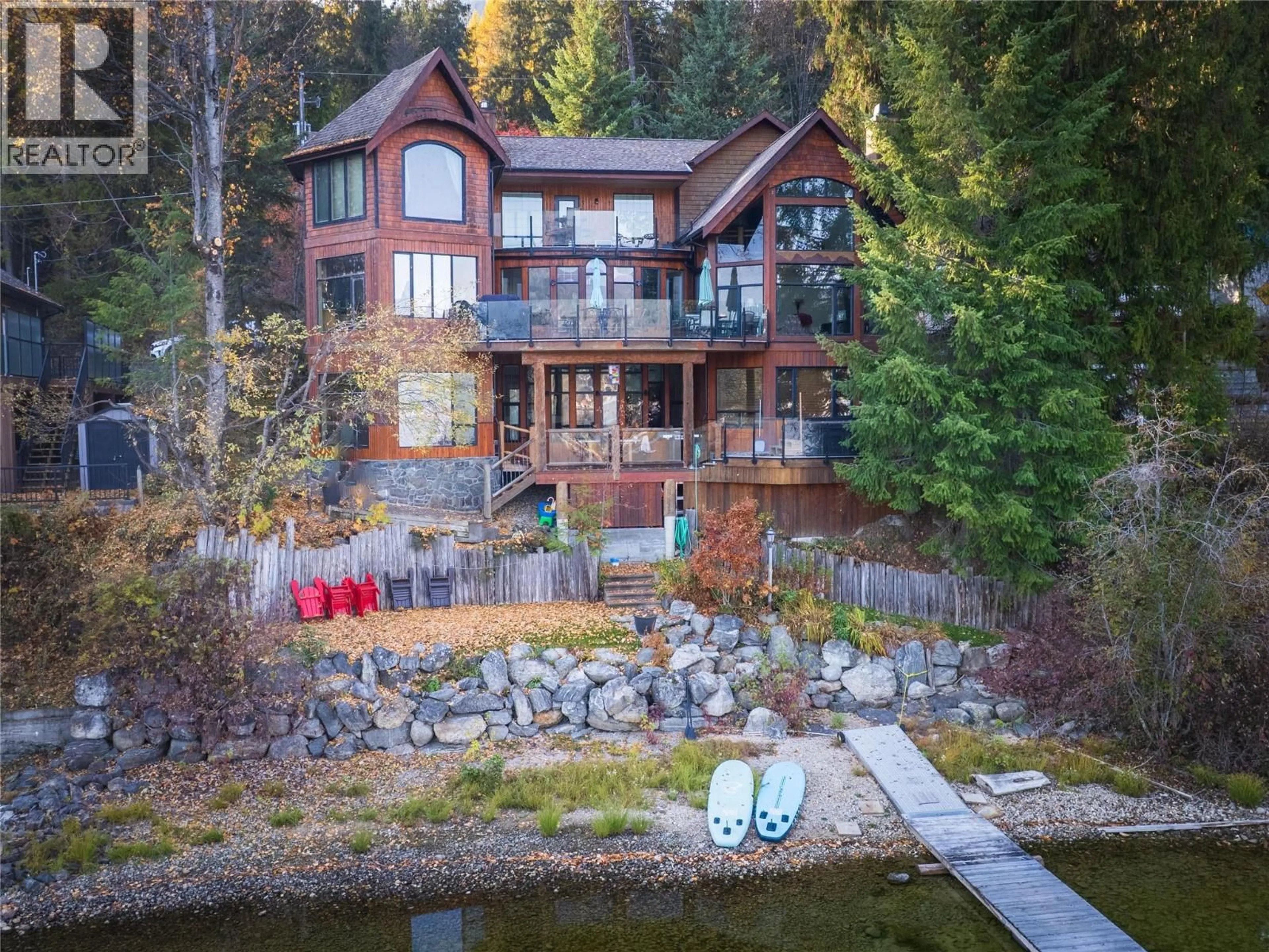 A pic from outside/outdoor area/front of a property/back of a property/a pic from drone, water/lake/river/ocean view for 1722 WEST LAKE DRIVE, Christina Lake British Columbia V0H1E0