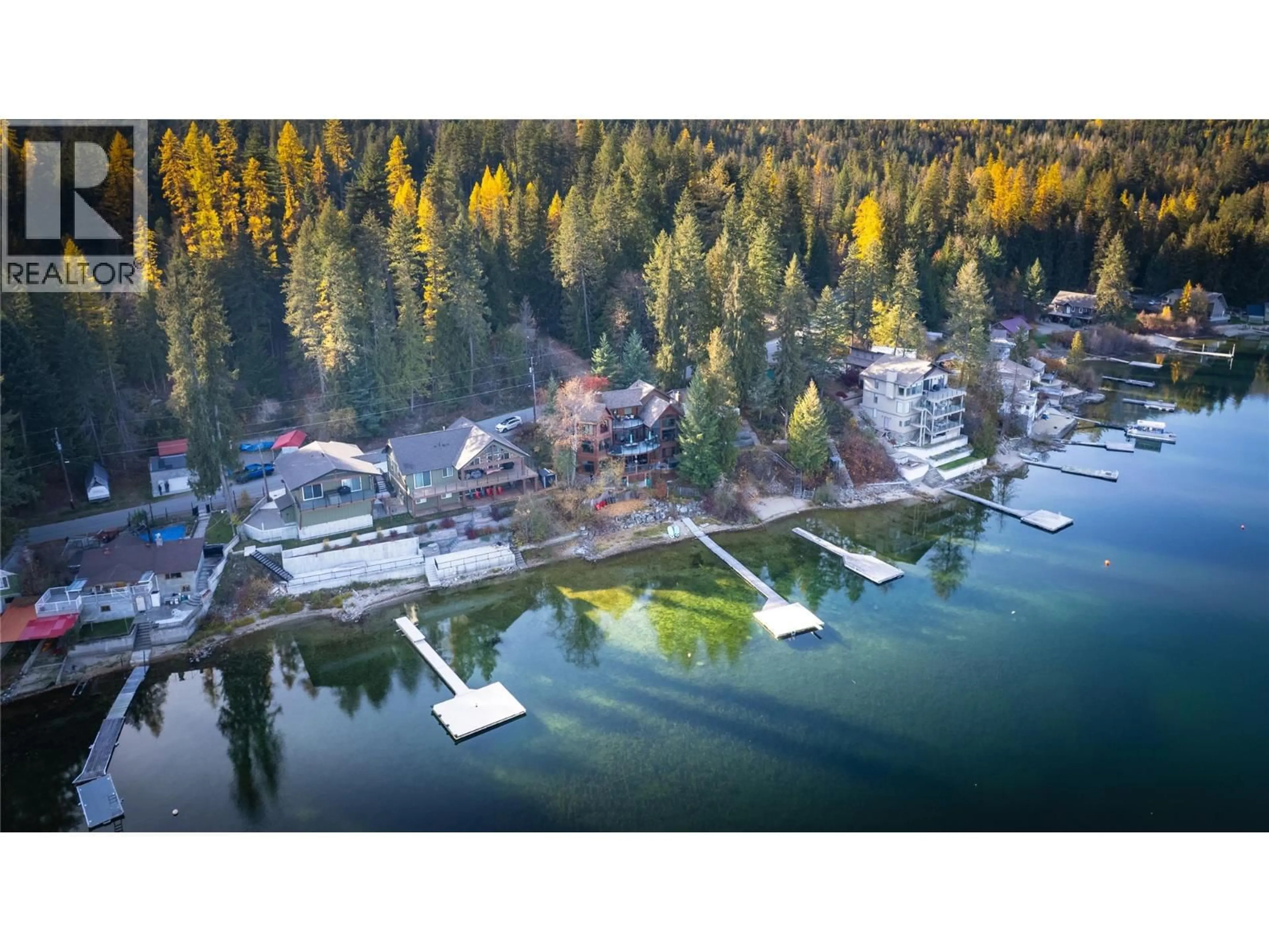A pic from outside/outdoor area/front of a property/back of a property/a pic from drone, water/lake/river/ocean view for 1722 WEST LAKE DRIVE, Christina Lake British Columbia V0H1E0