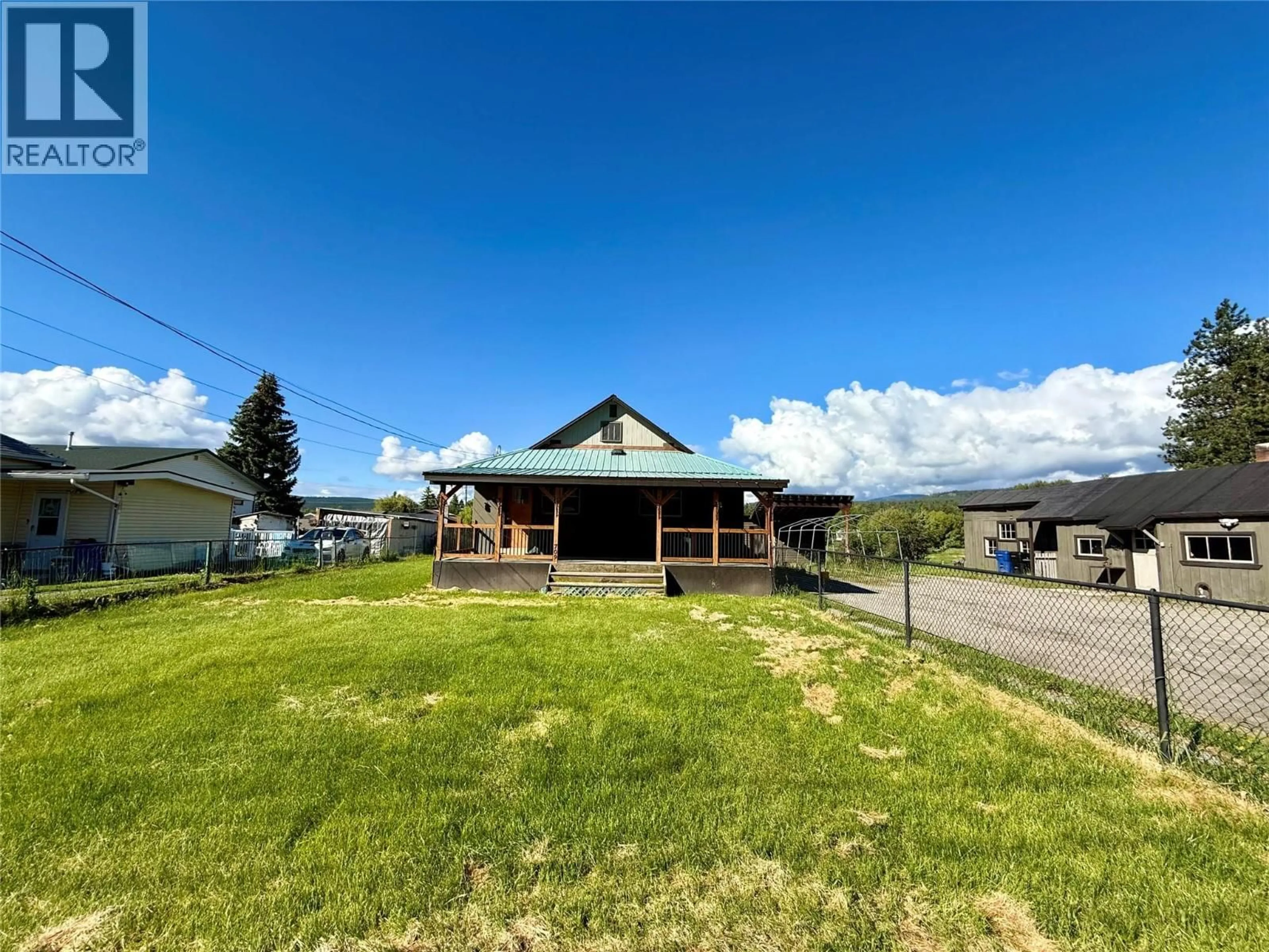 A pic from outside/outdoor area/front of a property/back of a property/a pic from drone, mountain view for 709 4TH STREET NORTHWEST, Cranbrook British Columbia V1C4A3