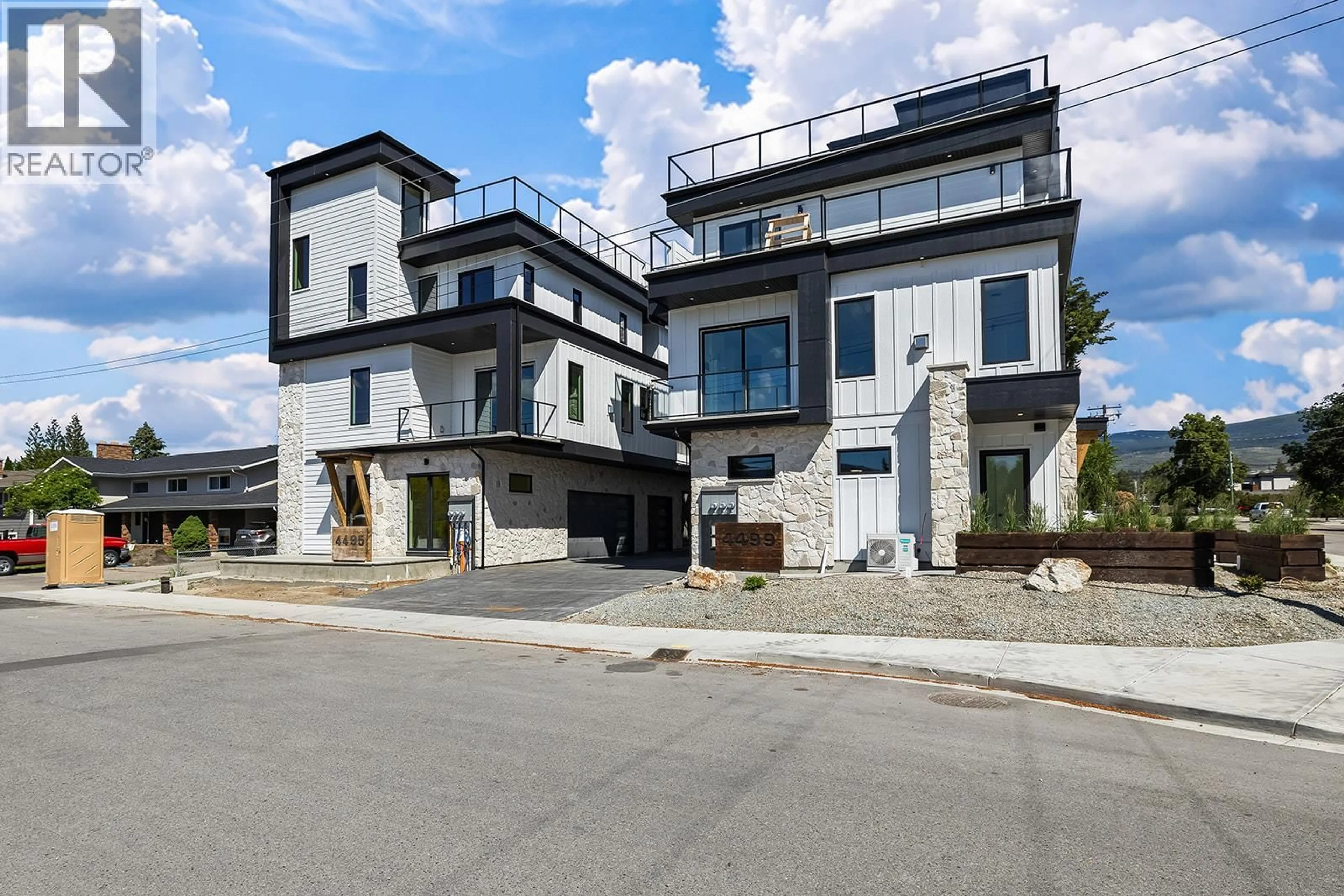 Home with brick exterior material, street for 1 - 4495 WALKER ROAD, Kelowna British Columbia V1W1G8