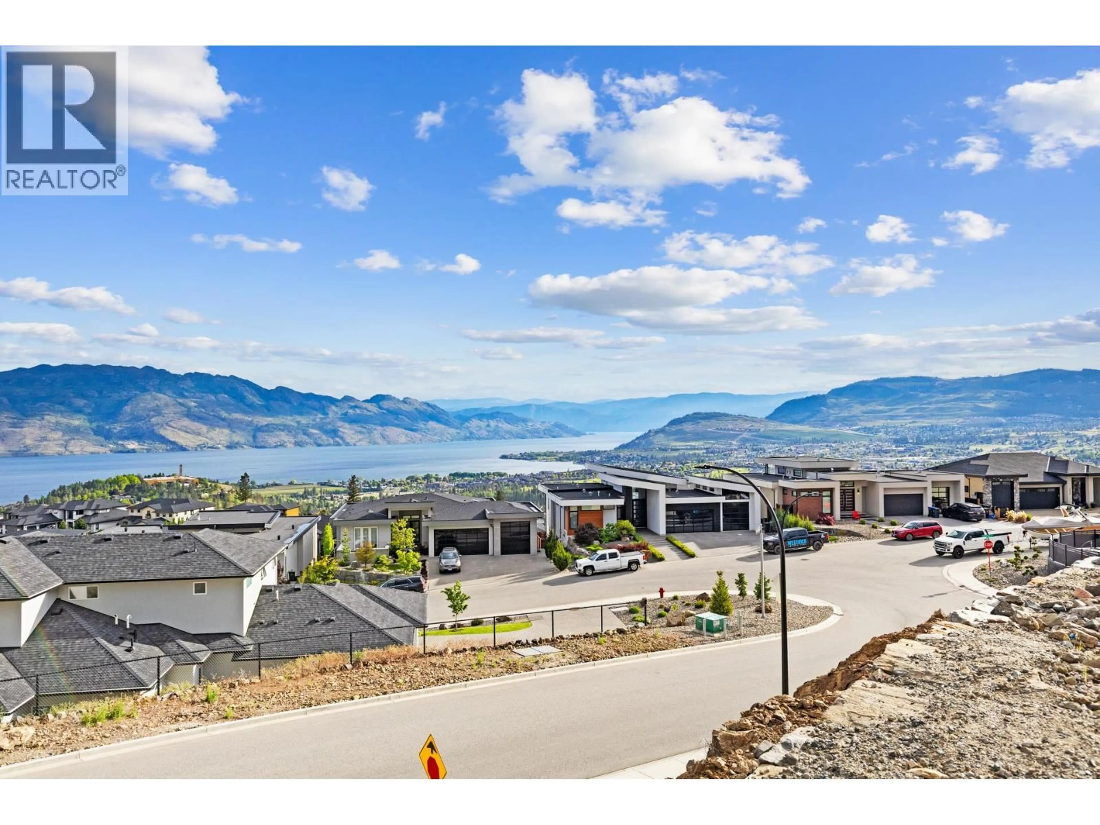 A pic from outside/outdoor area/front of a property/back of a property/a pic from drone, mountain view for 1643 TOURIGA PLACE, West Kelowna British Columbia V4T3B5