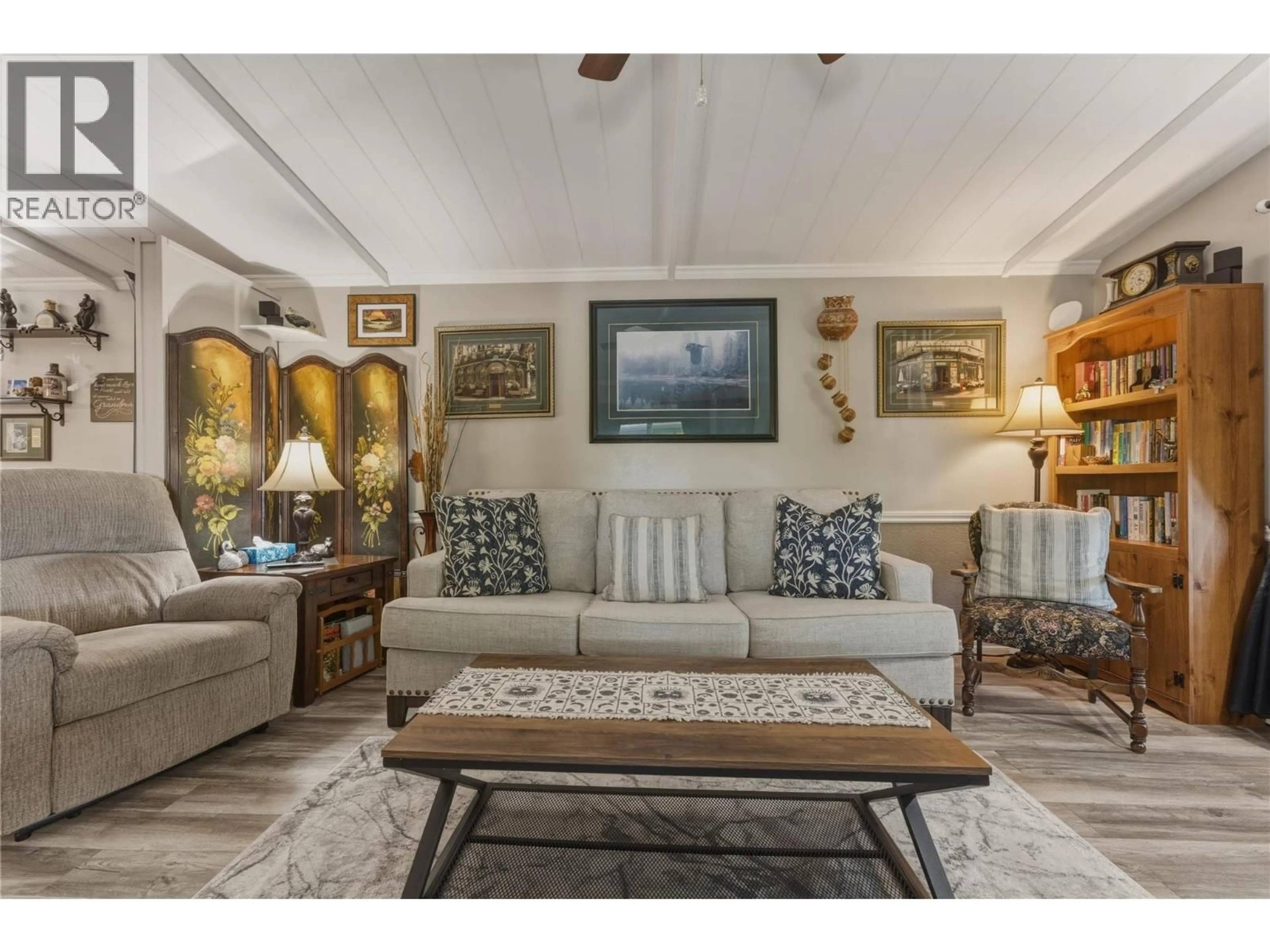 Living room with furniture, unknown for 6960 PLEASANT VALLEY ROAD, Vernon British Columbia V1B3R5