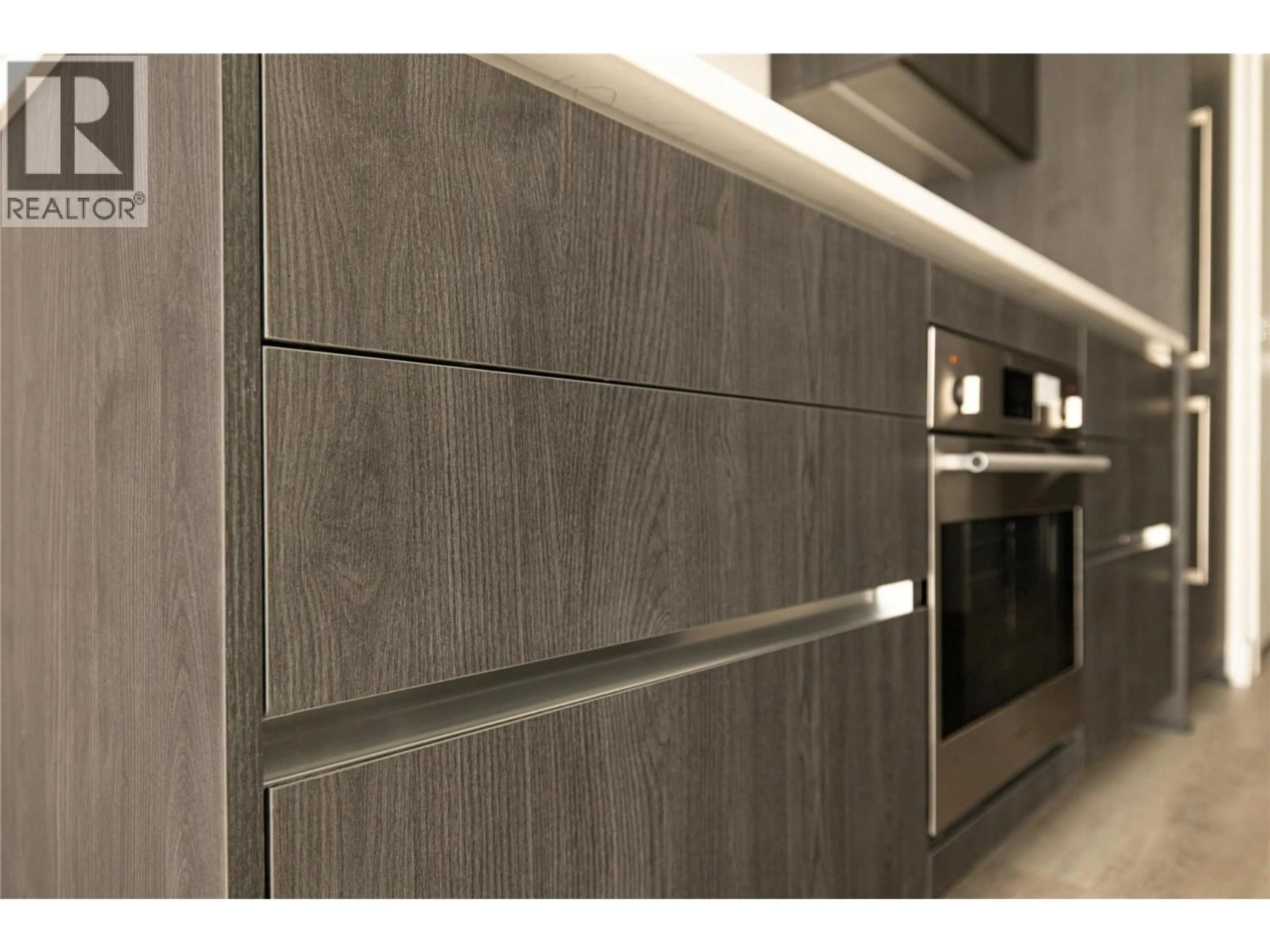 Contemporary kitchen, wood/laminate floor for 1206 - 1626 WATER STREET, Kelowna British Columbia V1Y1J9