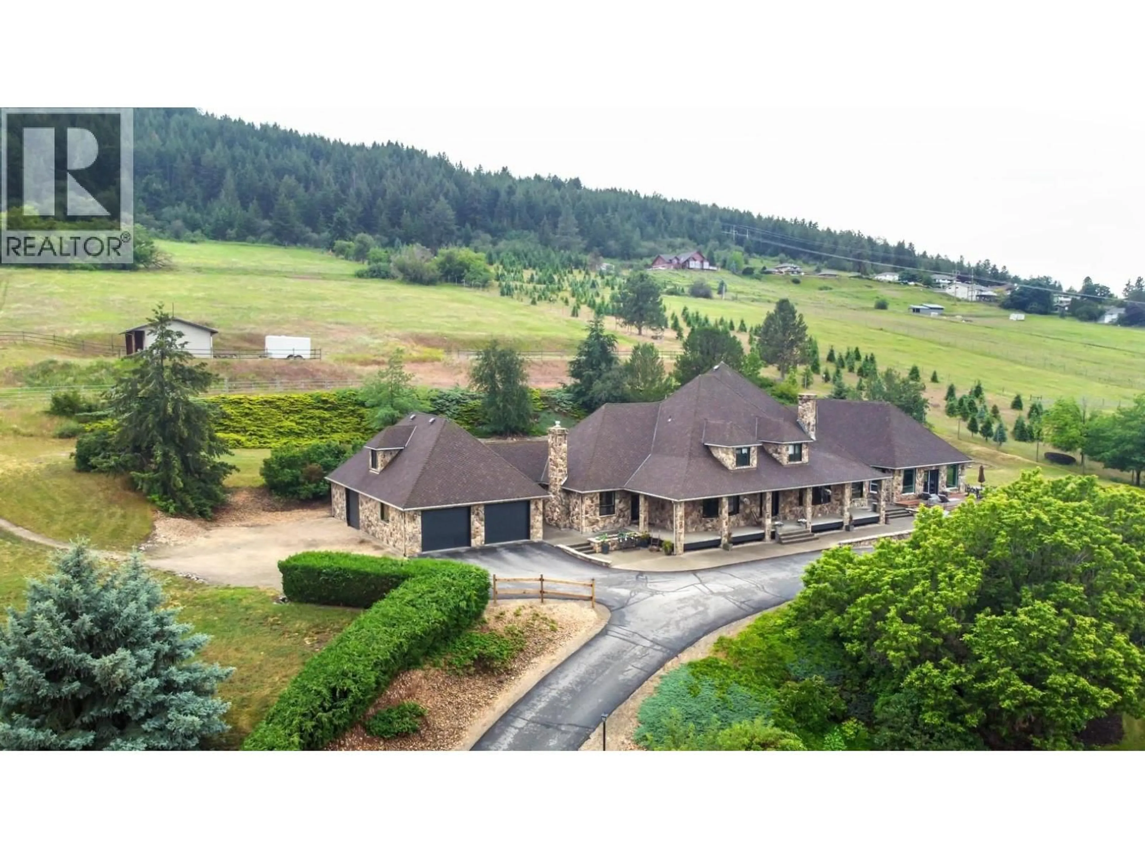 A pic from outside/outdoor area/front of a property/back of a property/a pic from drone, mountain view for 10802 COLDSTREAM CREEK ROAD, Coldstream British Columbia V1B1C9
