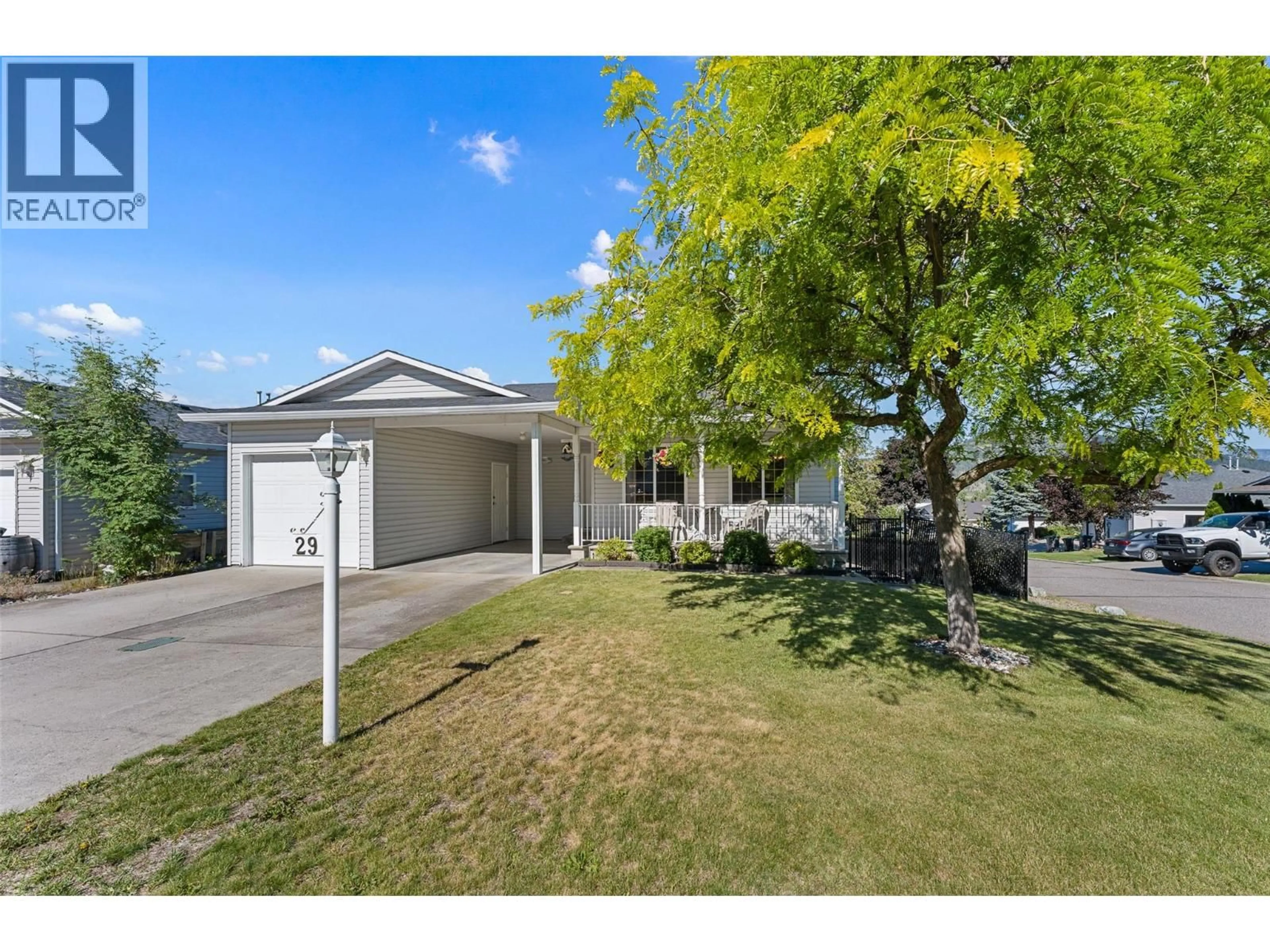 A pic from outside/outdoor area/front of a property/back of a property/a pic from drone, street for 29 - 6100 OLD VERNON ROAD, Kelowna British Columbia V1X7T8