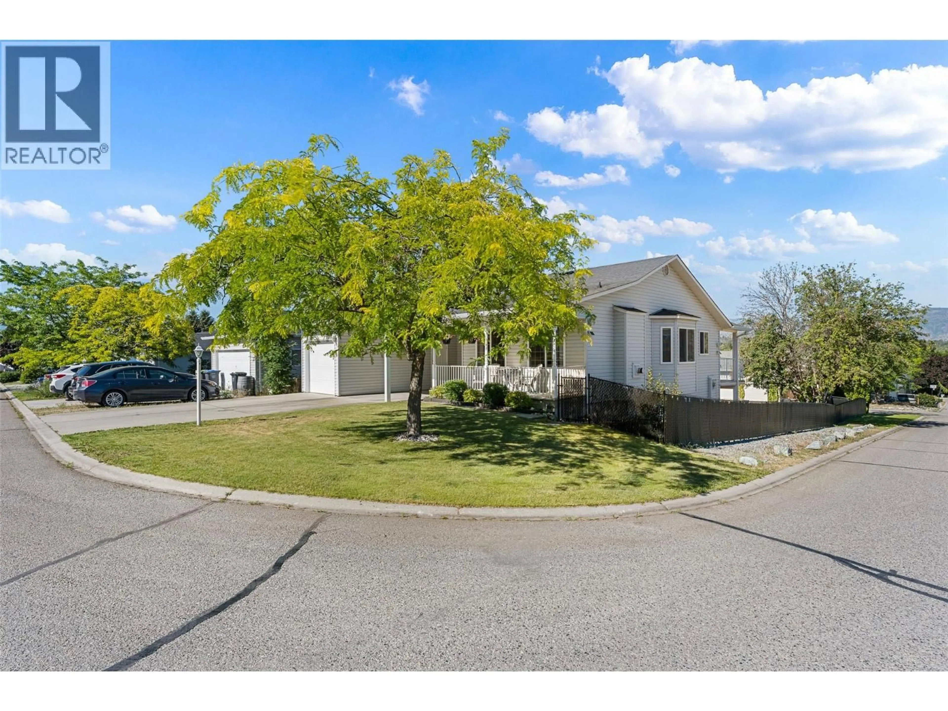 A pic from outside/outdoor area/front of a property/back of a property/a pic from drone, street for 29 - 6100 OLD VERNON ROAD, Kelowna British Columbia V1X7T8