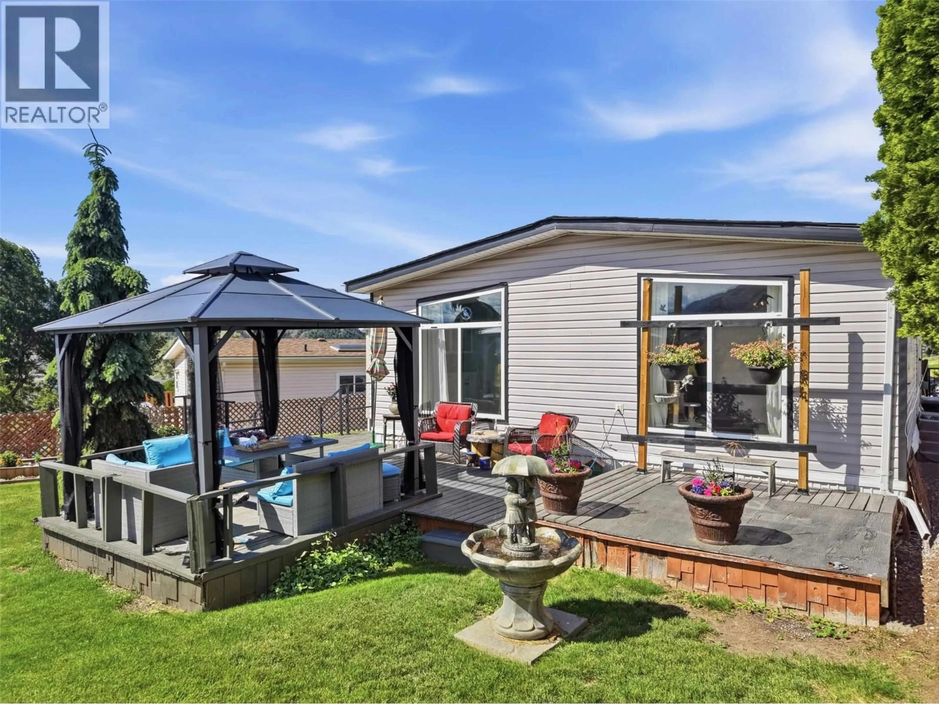 A pic from outside/outdoor area/front of a property/back of a property/a pic from drone, unknown for 35-3099 SHUSWAP ROAD, Kamloops British Columbia V2H1T7