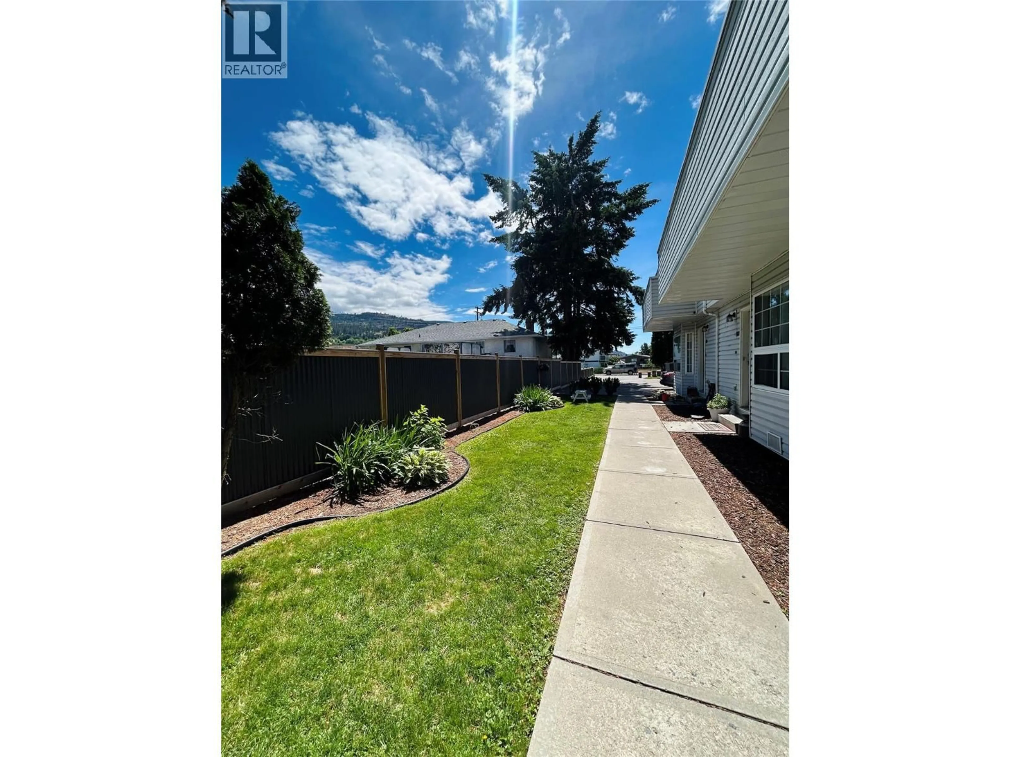 A pic from outside/outdoor area/front of a property/back of a property/a pic from drone, unknown for 103 - 173 GREEN AVENUE, Penticton British Columbia V2A3S9