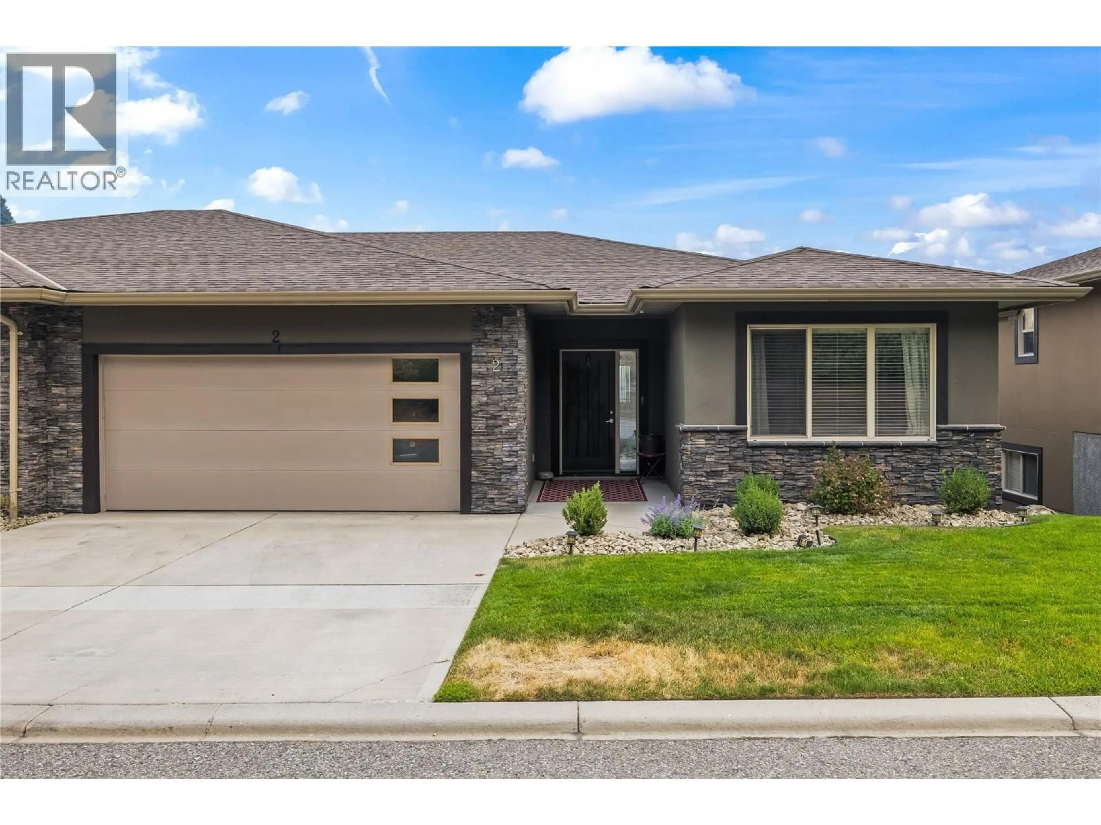 Home with brick exterior material, street for 2 - 2421 GLACIER COURT, Kelowna British Columbia V1V3A6