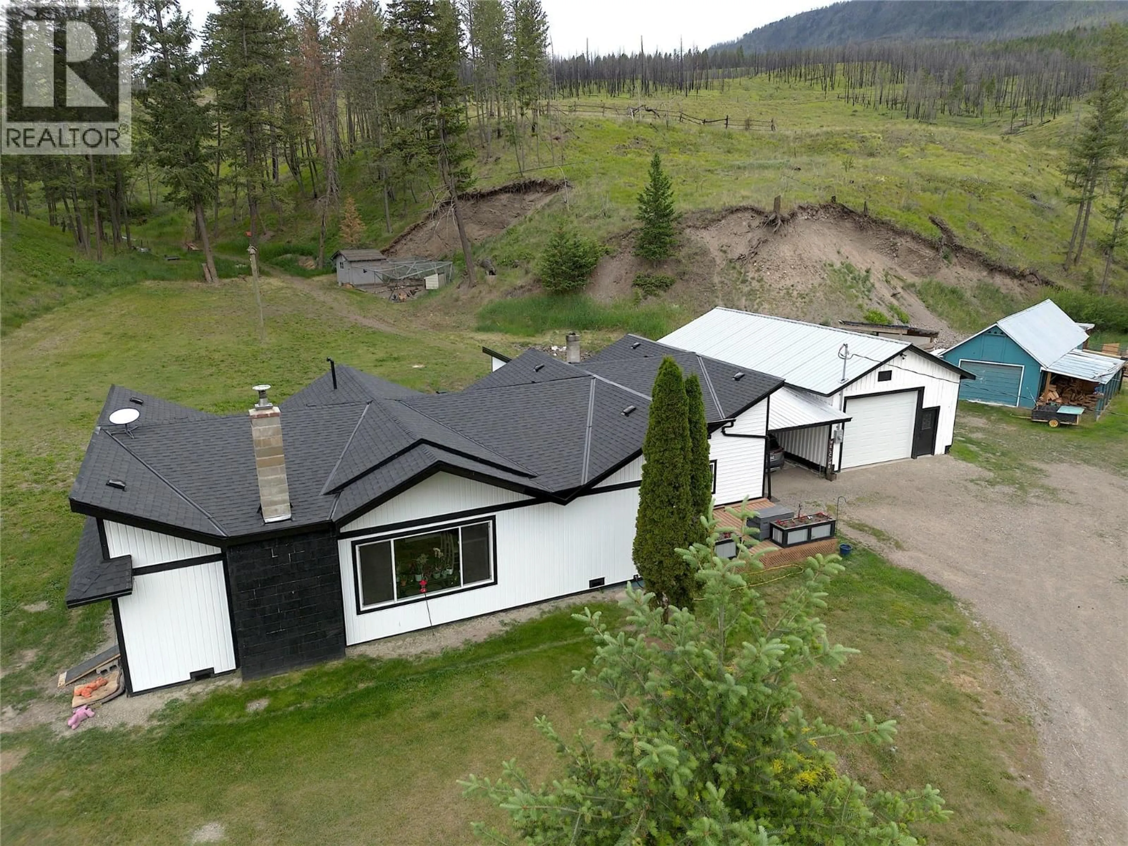 A pic from outside/outdoor area/front of a property/back of a property/a pic from drone, mountain view for 4316 KAMLOOPS VERNON HIGHWAY, Westwold British Columbia V0E3B1