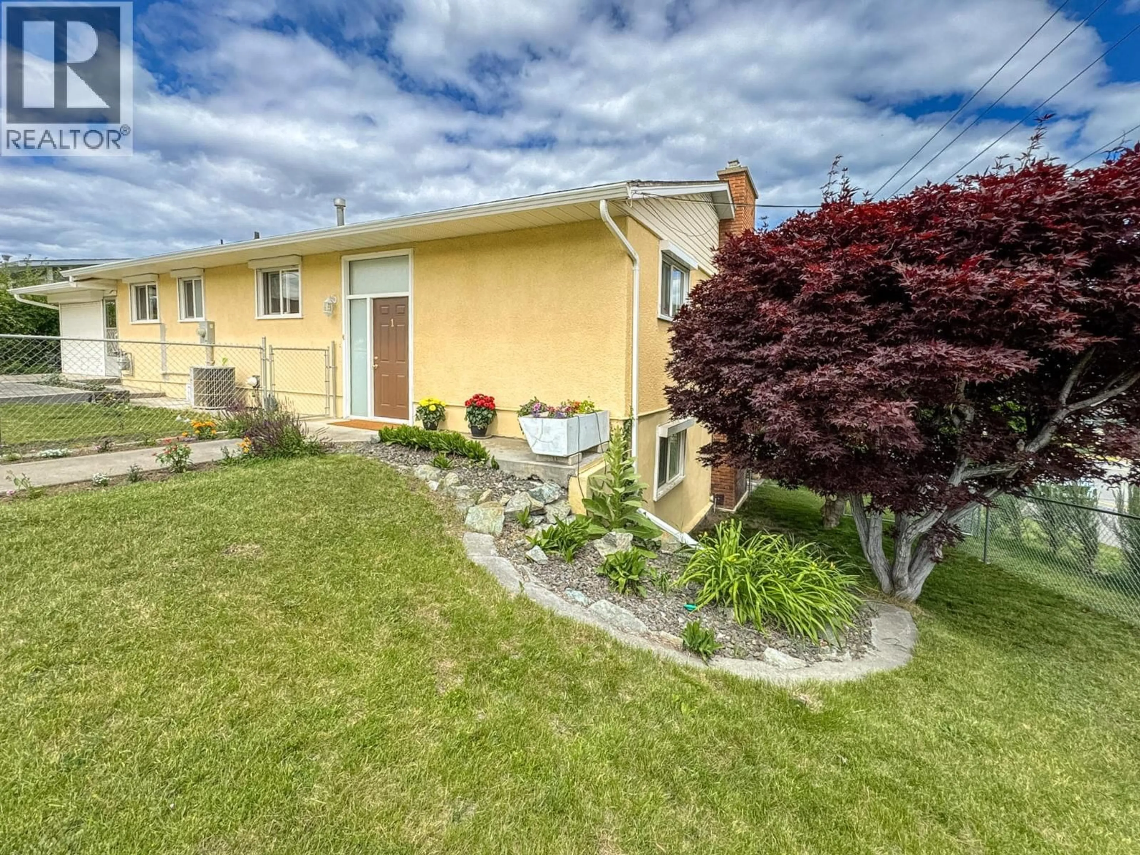 A pic from outside/outdoor area/front of a property/back of a property/a pic from drone, street for 1 FINCH CRESCENT, Osoyoos British Columbia V0H1V5