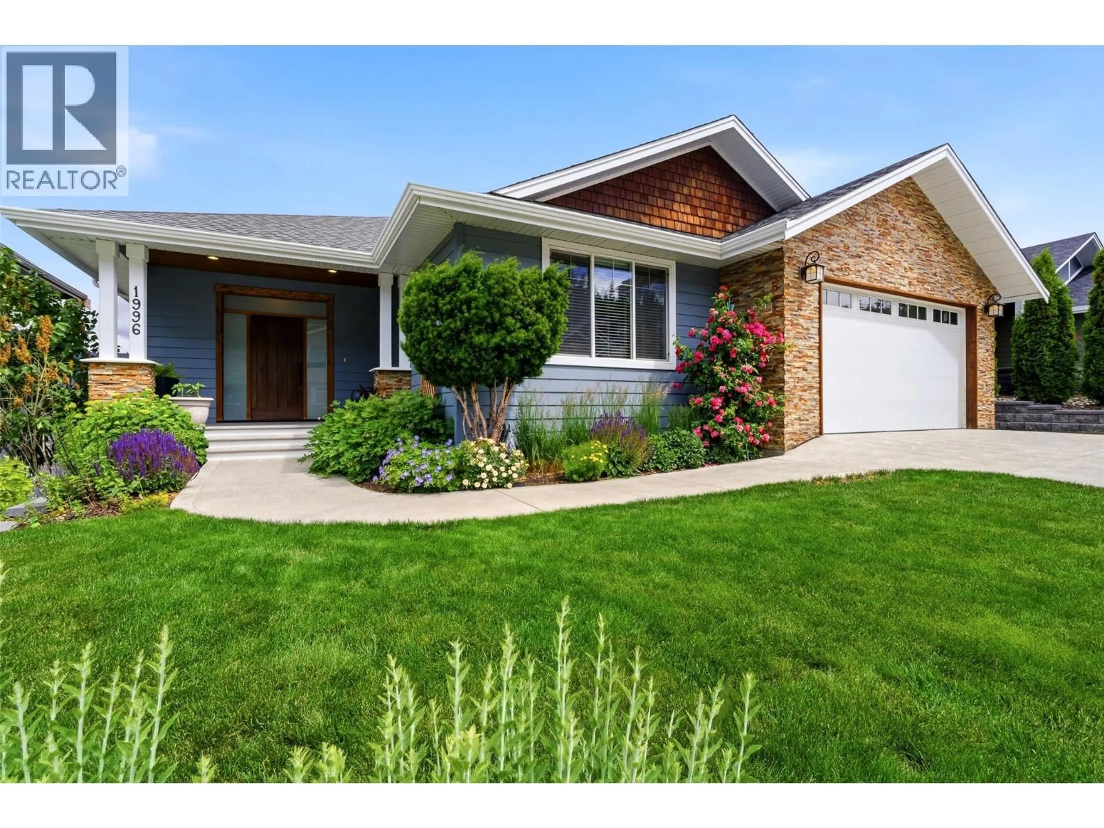 Home with vinyl exterior material, street for 1996 GALORE CRESCENT, Kamloops British Columbia V2E0A7