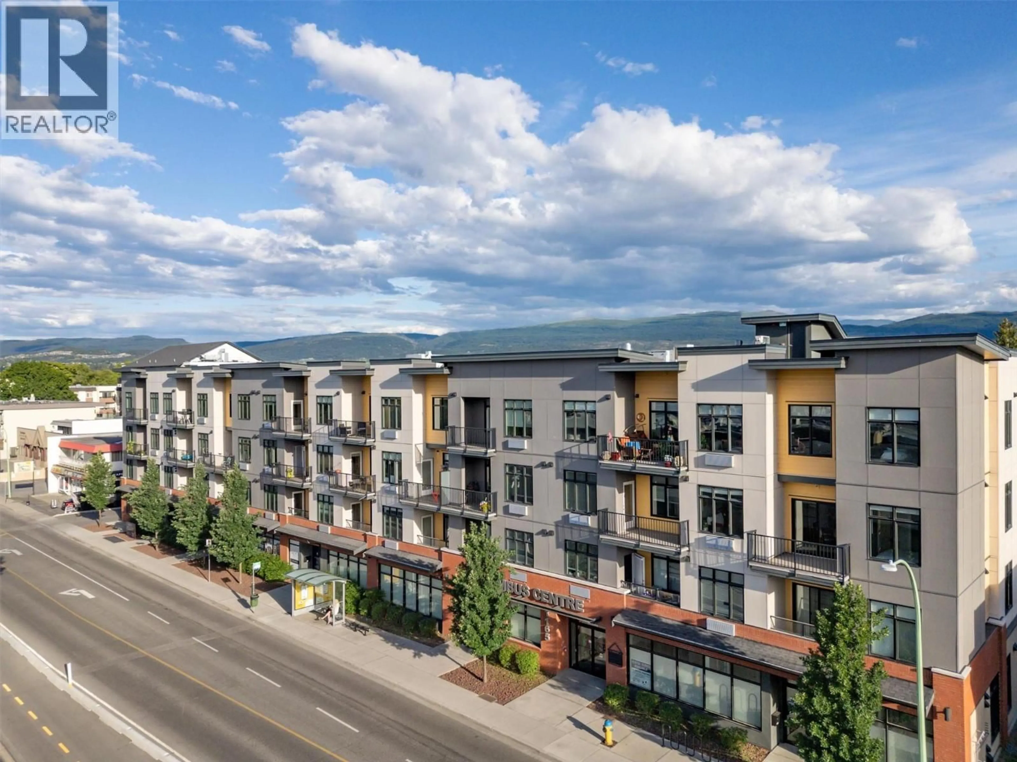 A pic from outside/outdoor area/front of a property/back of a property/a pic from drone, mountain view for 405 - 1165 SUTHERLAND AVENUE, Kelowna British Columbia V1Y0J3
