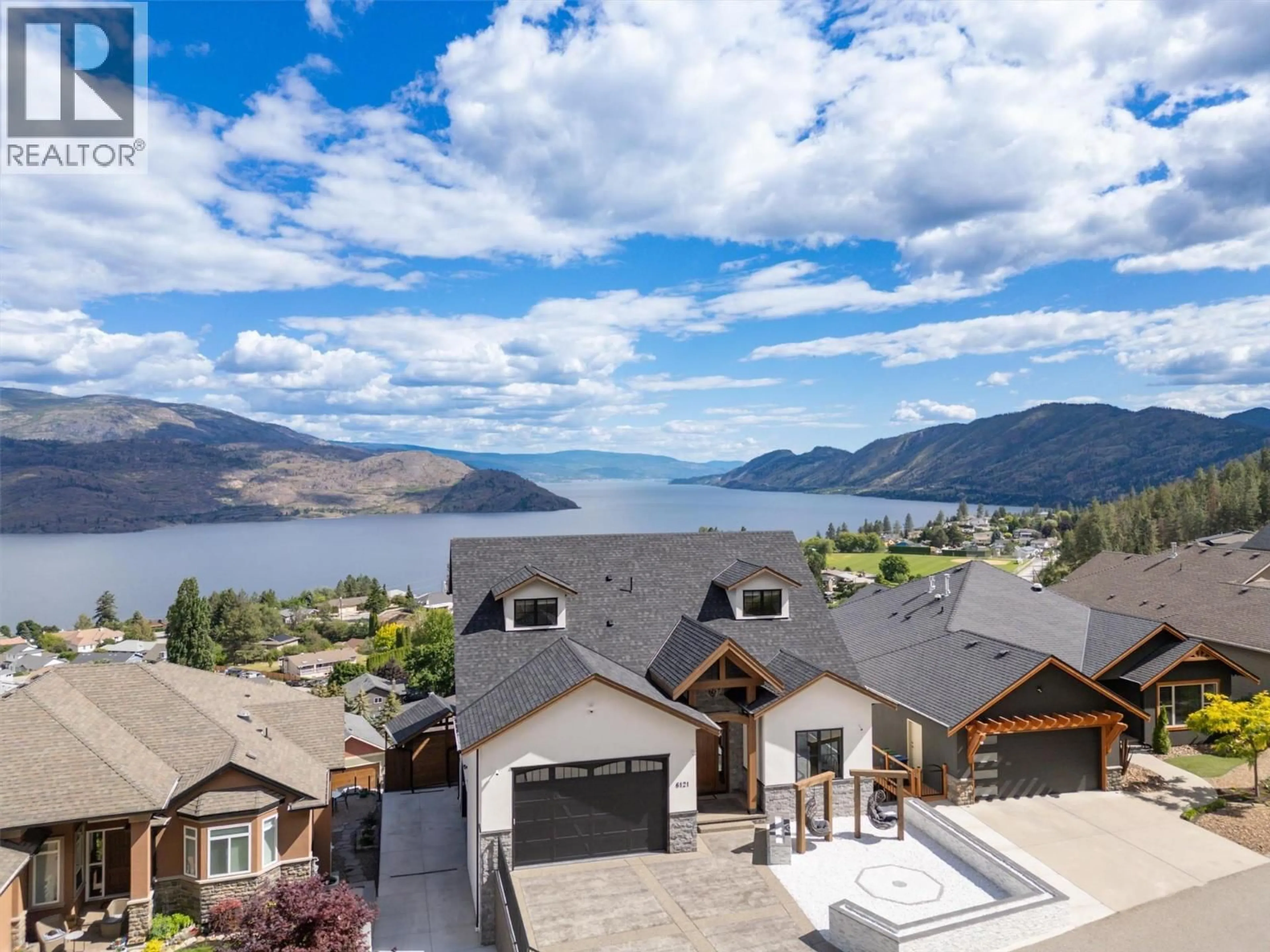 A pic from outside/outdoor area/front of a property/back of a property/a pic from drone, water/lake/river/ocean view for 6121 SEYMOURE LANE, Peachland British Columbia V0H1X4