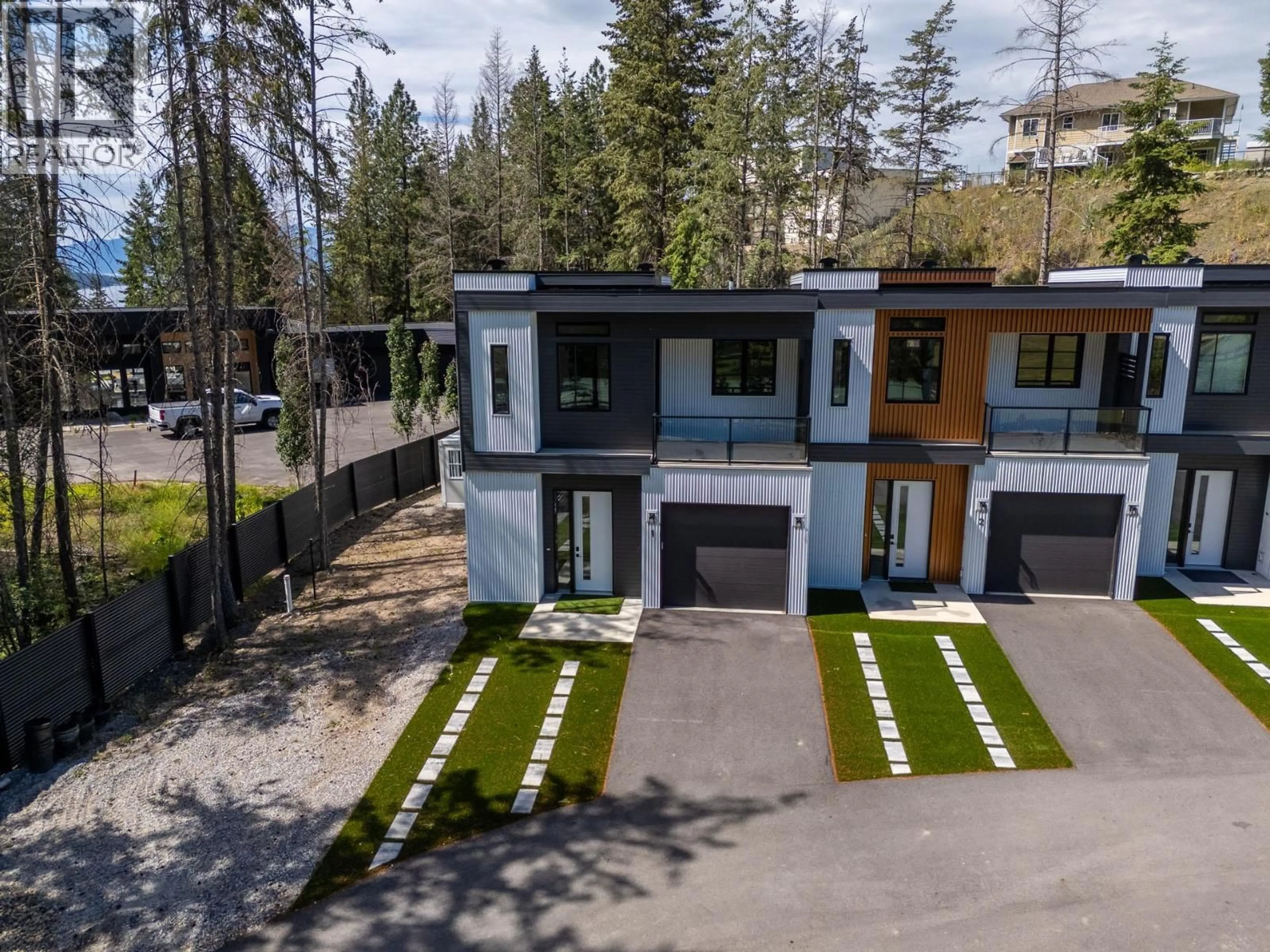 A pic from outside/outdoor area/front of a property/back of a property/a pic from drone, street for 2 - 9188 TRONSON ROAD, Vernon British Columbia V1H1E2