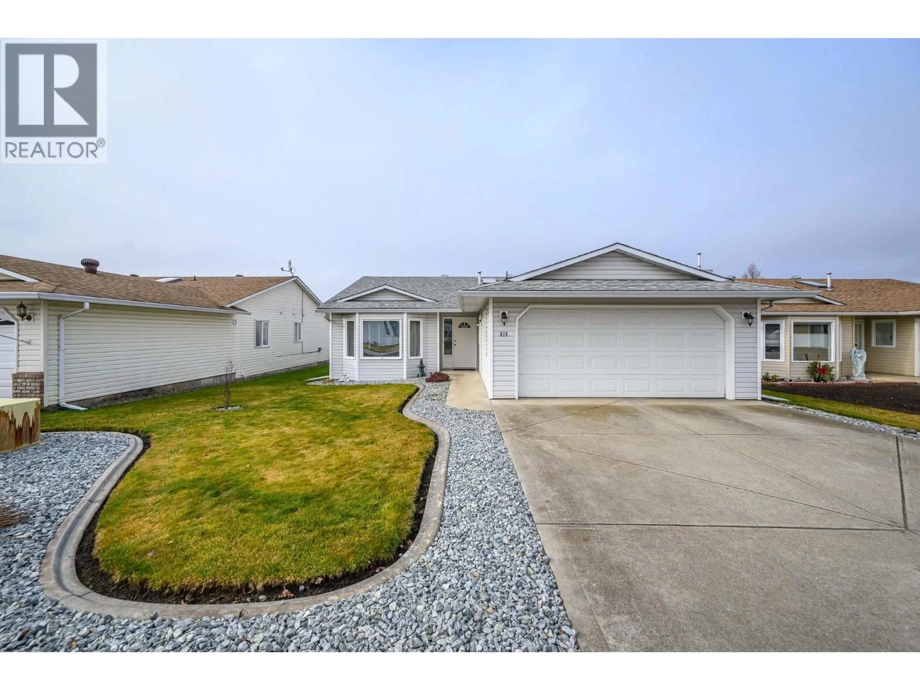 Home with vinyl exterior material, street for 414 4 STREET, Vernon British Columbia V1H1Z1