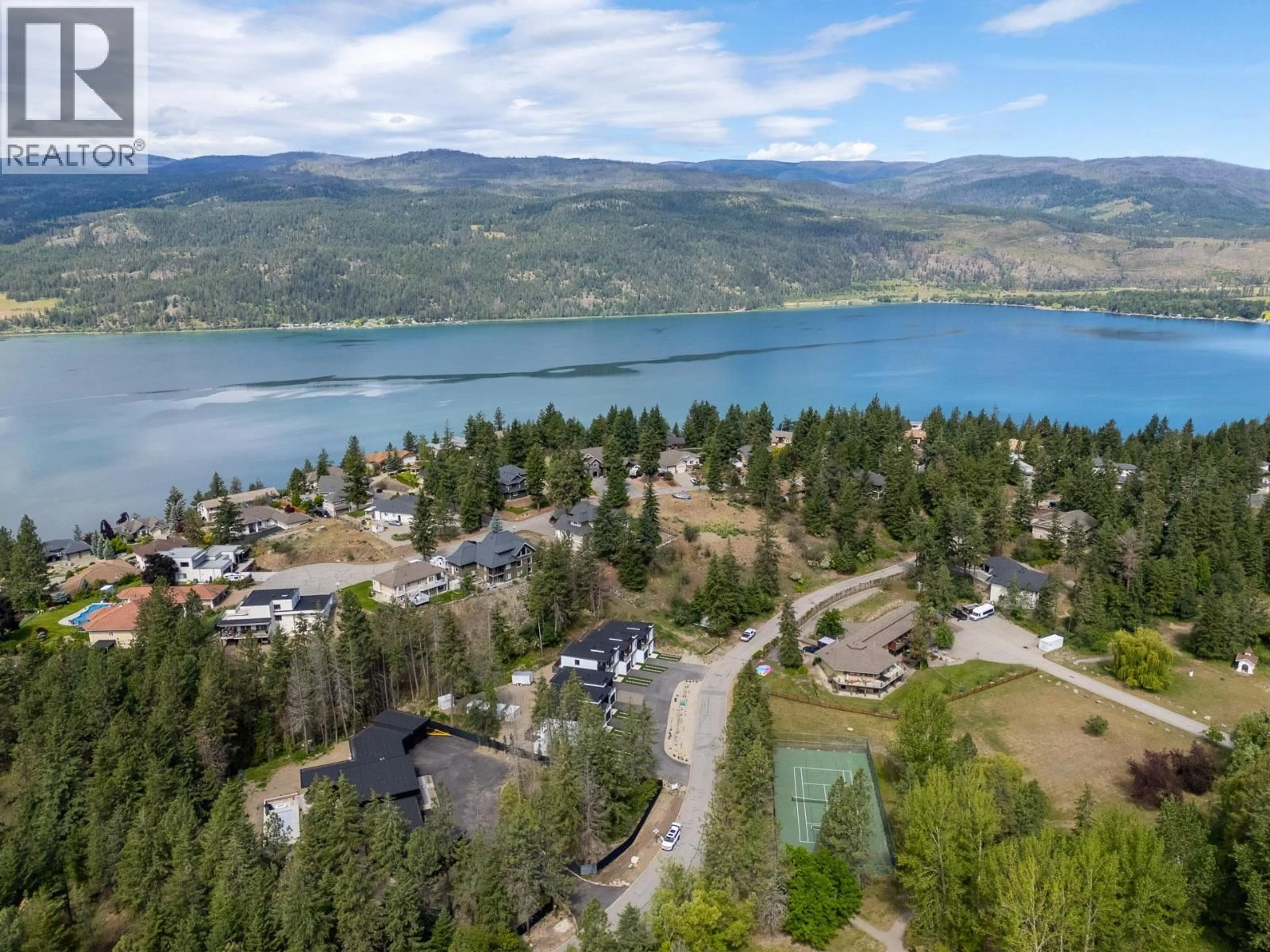 A pic from outside/outdoor area/front of a property/back of a property/a pic from drone, water/lake/river/ocean view for 4 - 9188 TRONSON ROAD, Vernon British Columbia V1H1E2
