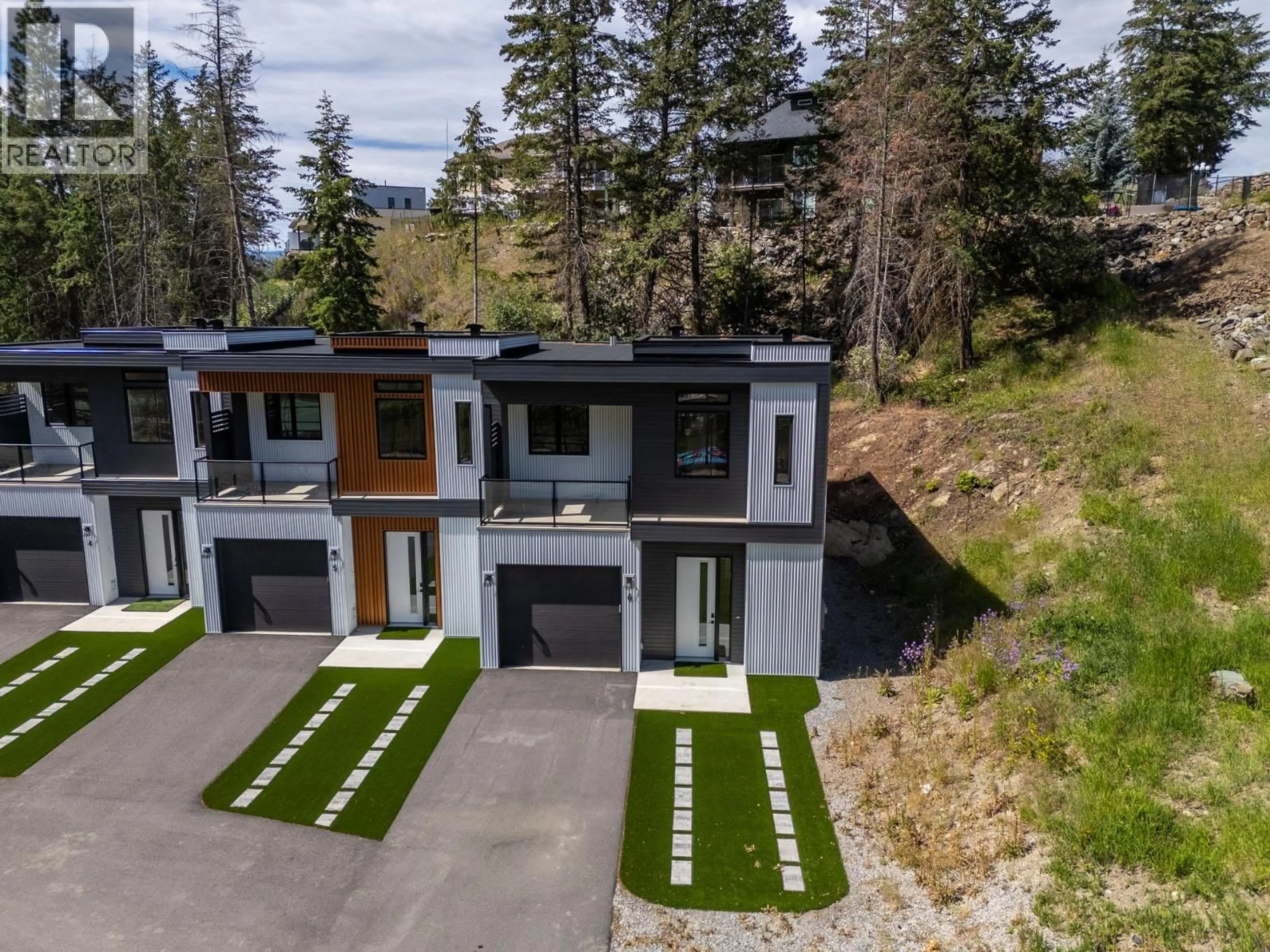 A pic from outside/outdoor area/front of a property/back of a property/a pic from drone, street for 6 - 9188 TRONSON ROAD, Vernon British Columbia V1H1E2